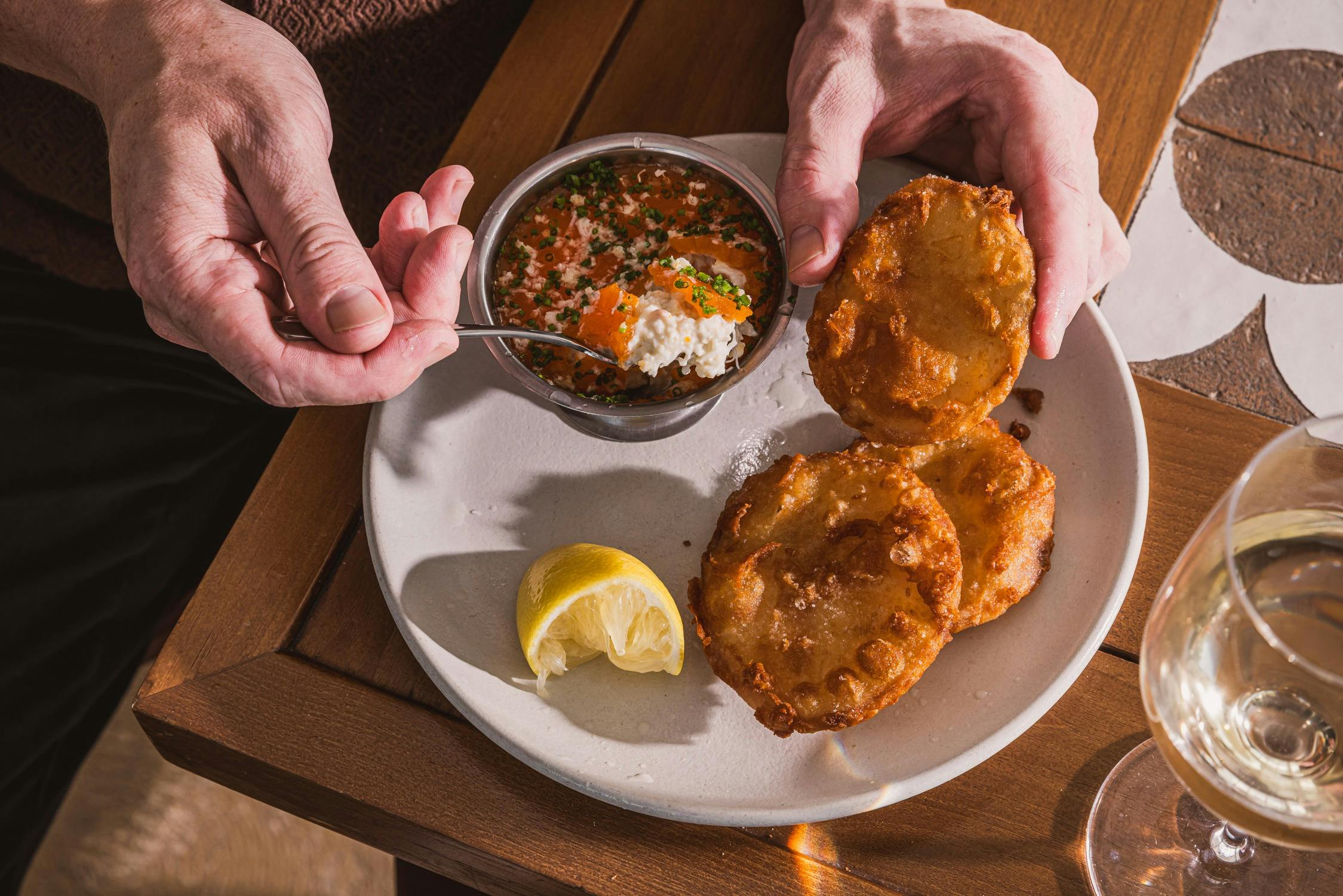 Potted blue swimmer crab with salt and vinegar potato scallops