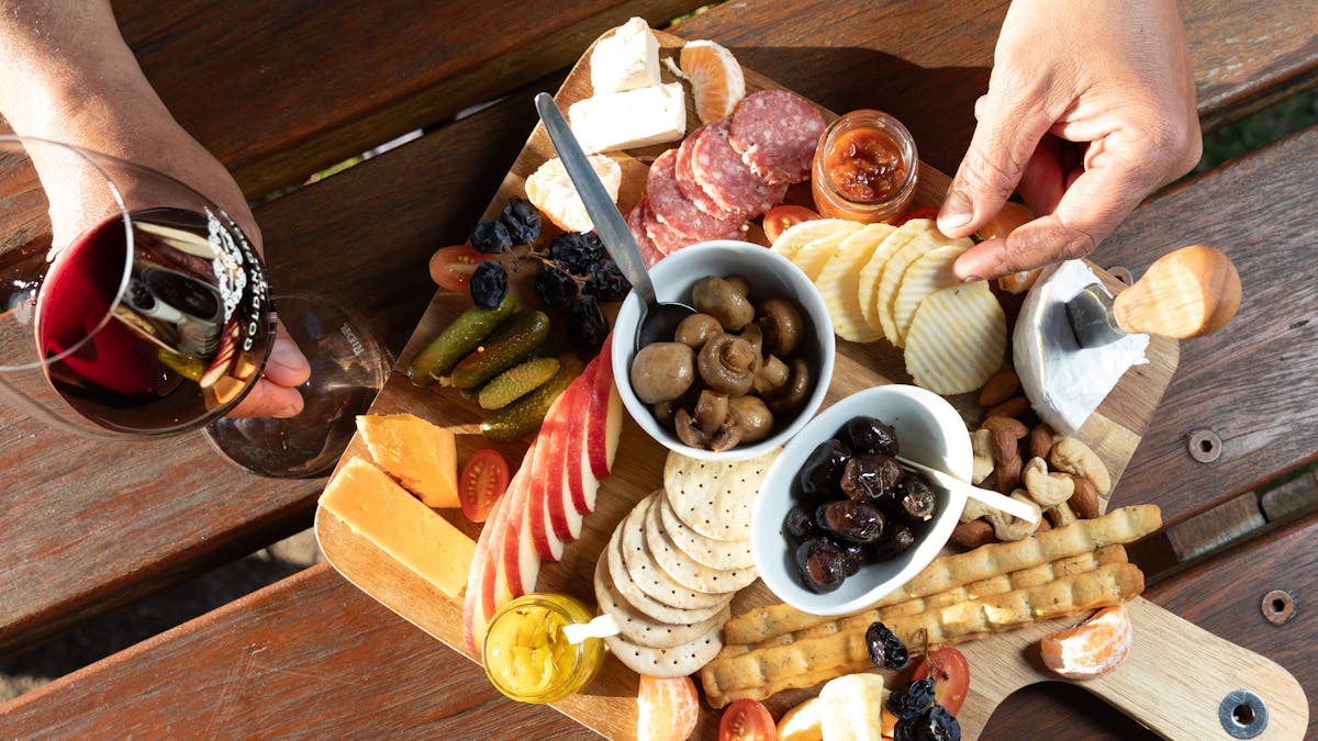 Delicious Grazing Platter with a glass of wine
