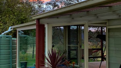 Glass enclosed spa at spa cottage