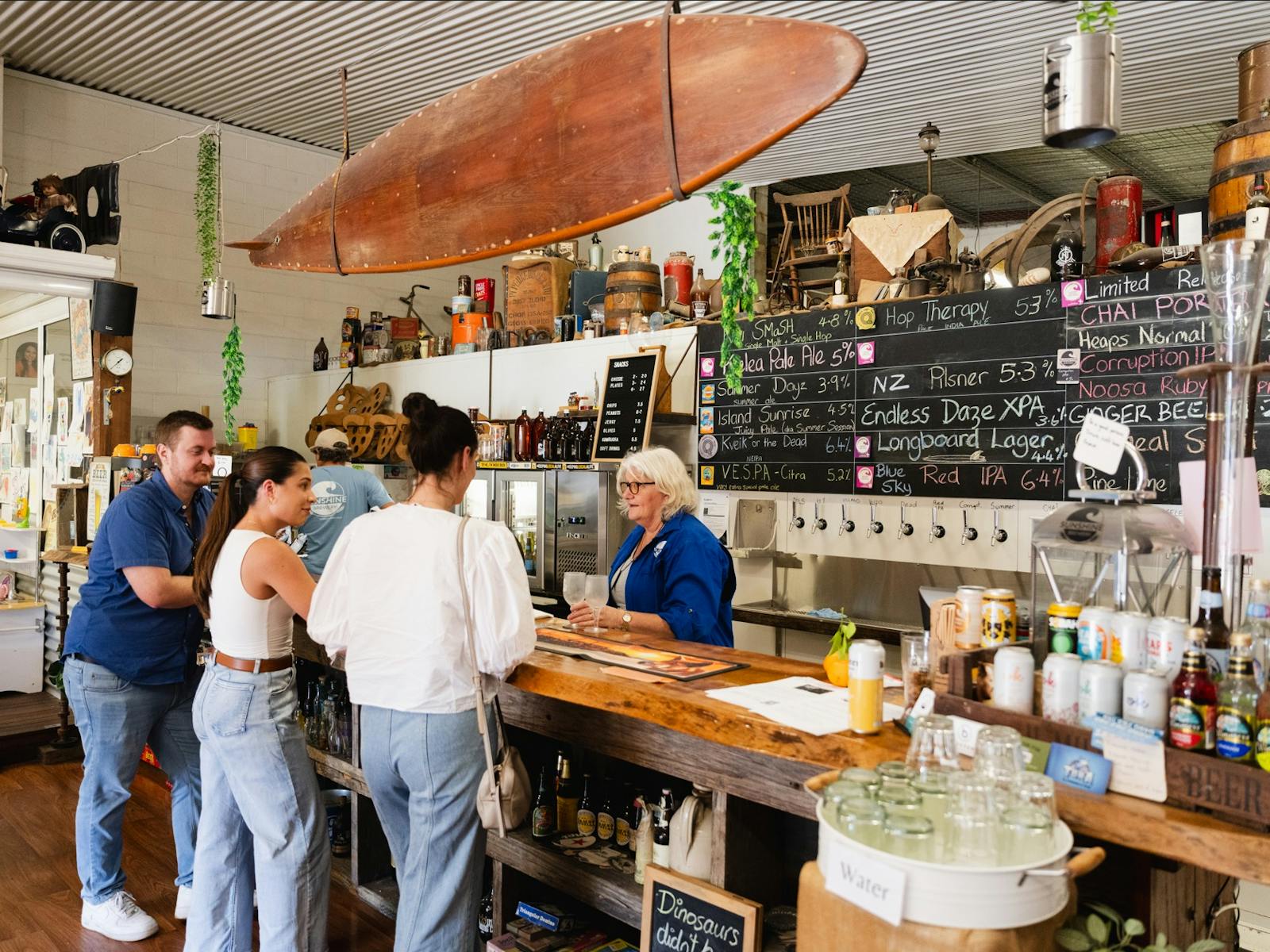 Group of people ordering at a unique brewery bar