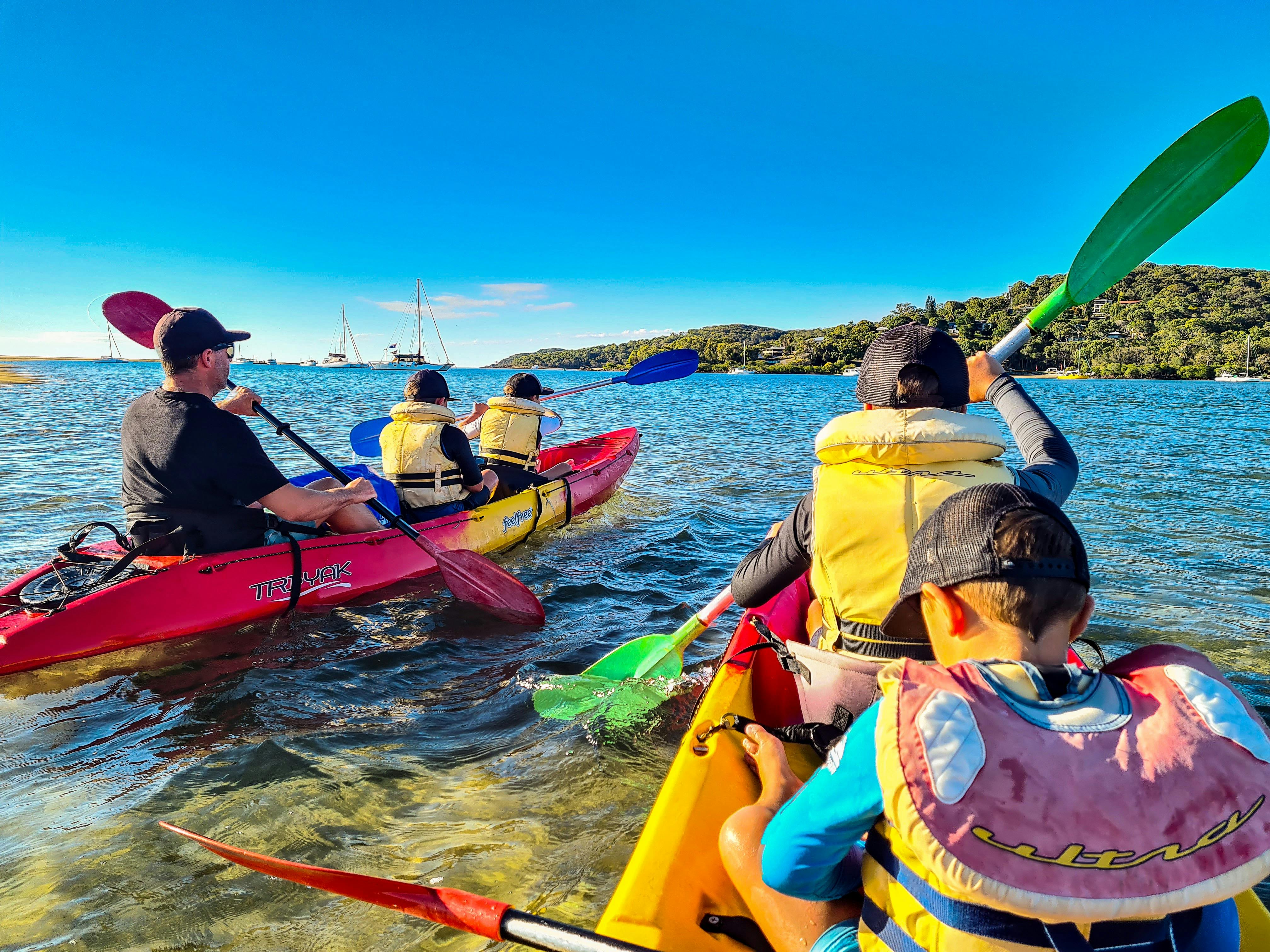 Family of six Family of six in two triple kayaks enjoying a 1770 Lin two triple kayaks enjoying 1770