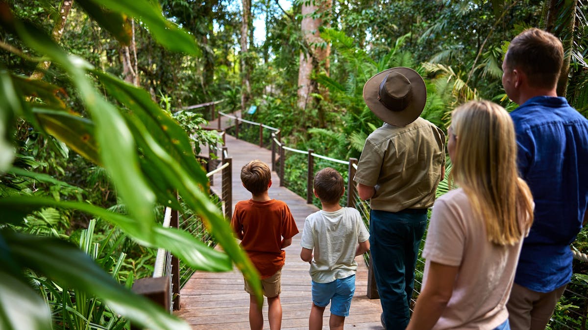 Family enjoying a complimentary Ranger Guided Tour at Skyrail's Red Peak  Boardwalk
