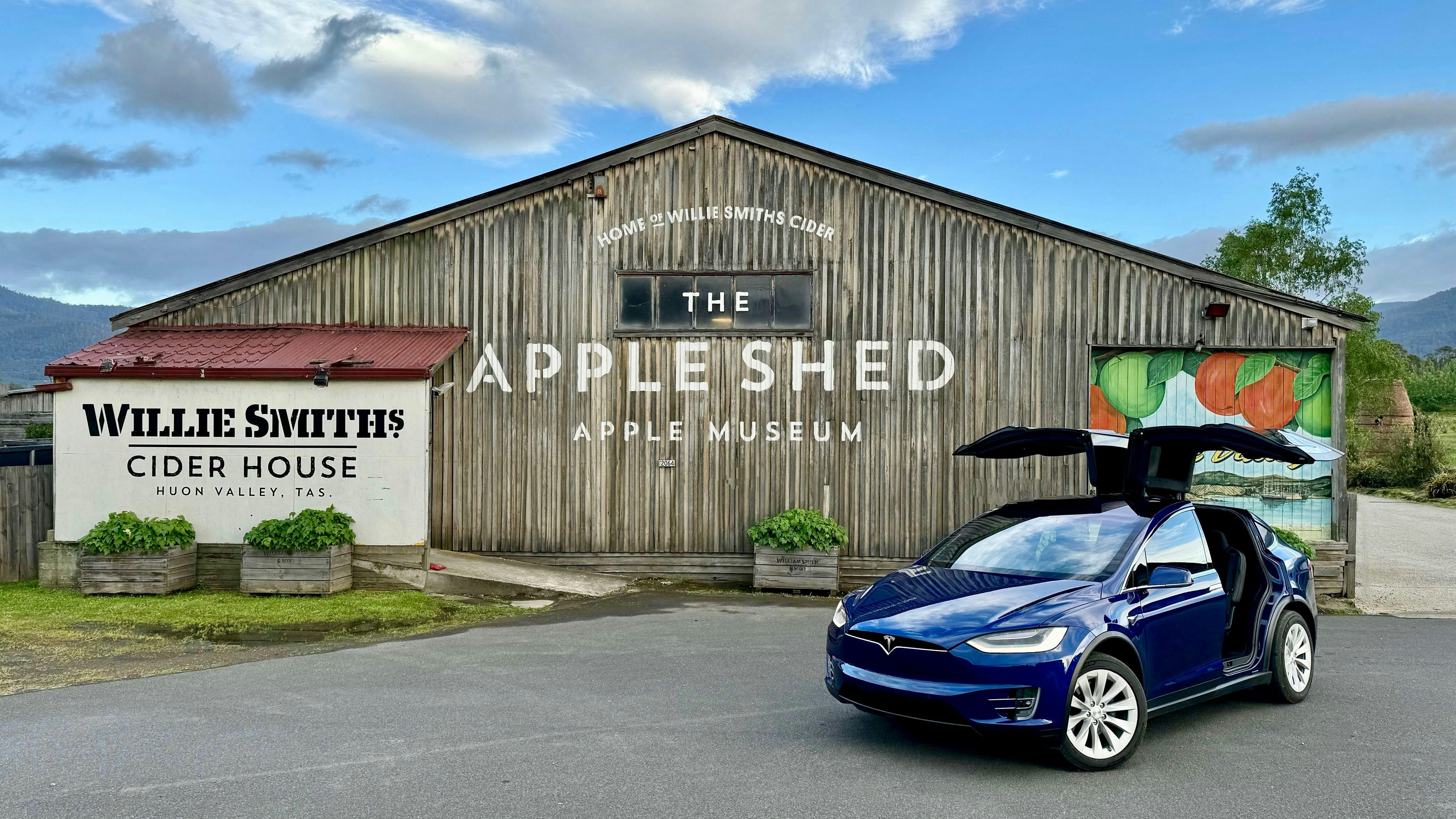 EVRide Tesla Model X at Willie Smiths Apple Shed with falcon-wing doors open