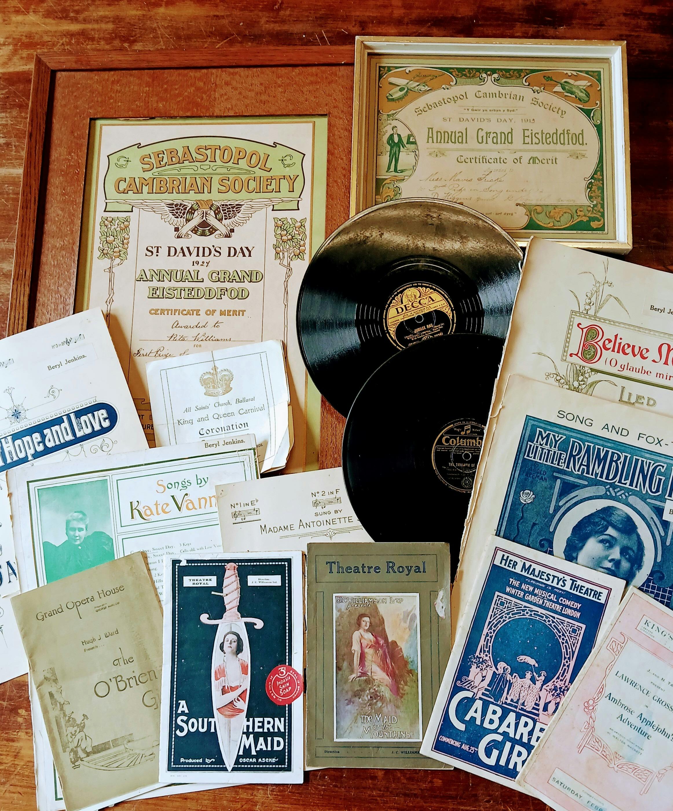 A collage of sheet music, theatre programs, concert awards and 78 rpm records.