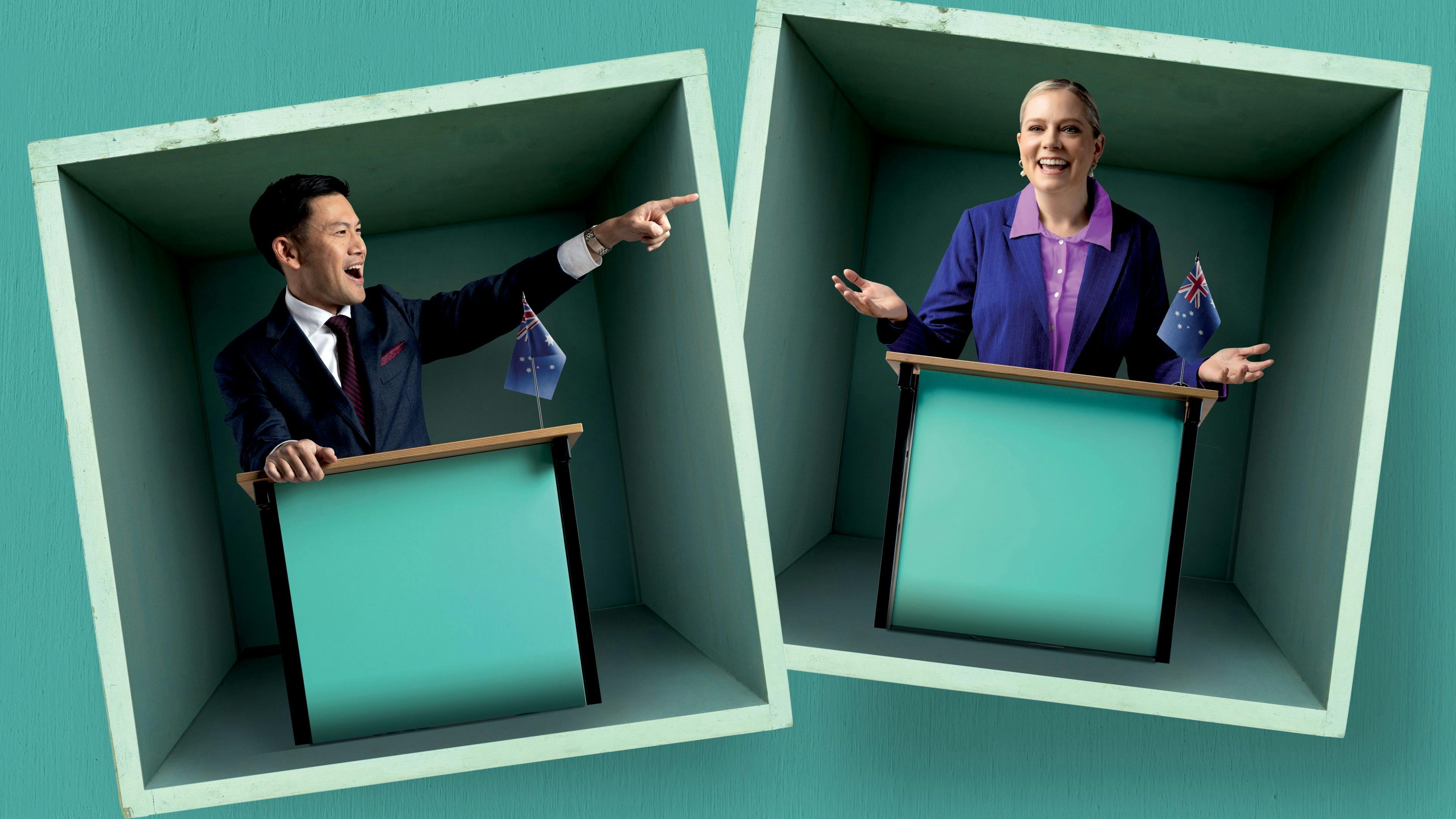 A man and woman, both in suits, stand behind speech podiums