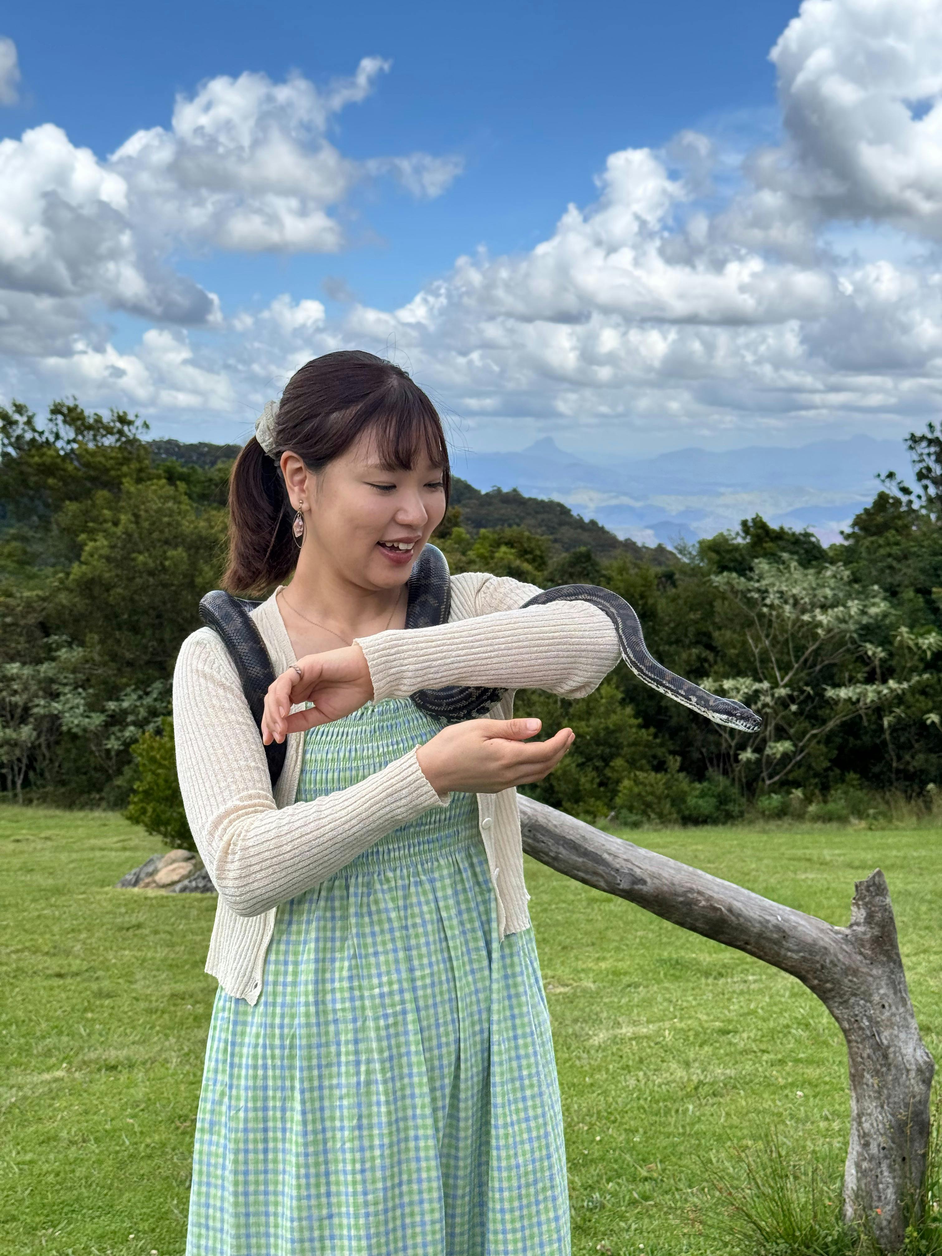 Picture with a friendly snake at O'Reilly's Rainforest Retreat, Lamington National Park