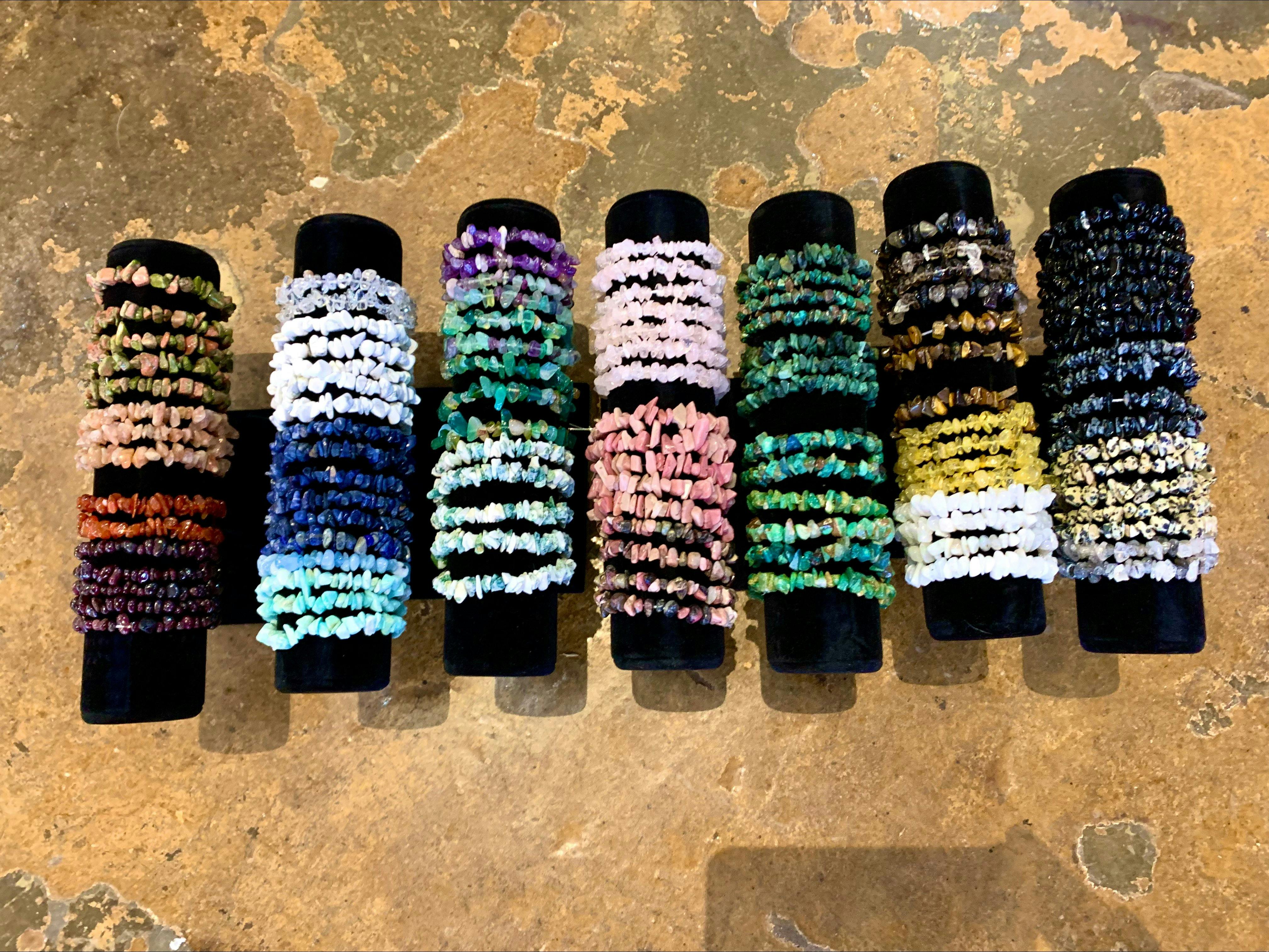 A varierty of crystal chip bracets on 7 tube holders