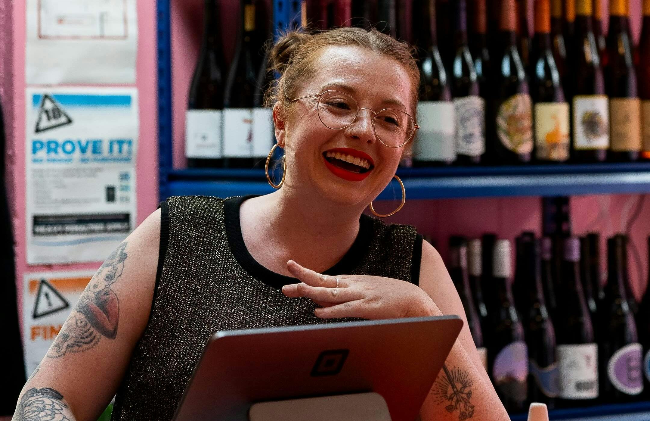 Hostess smiles at Bar