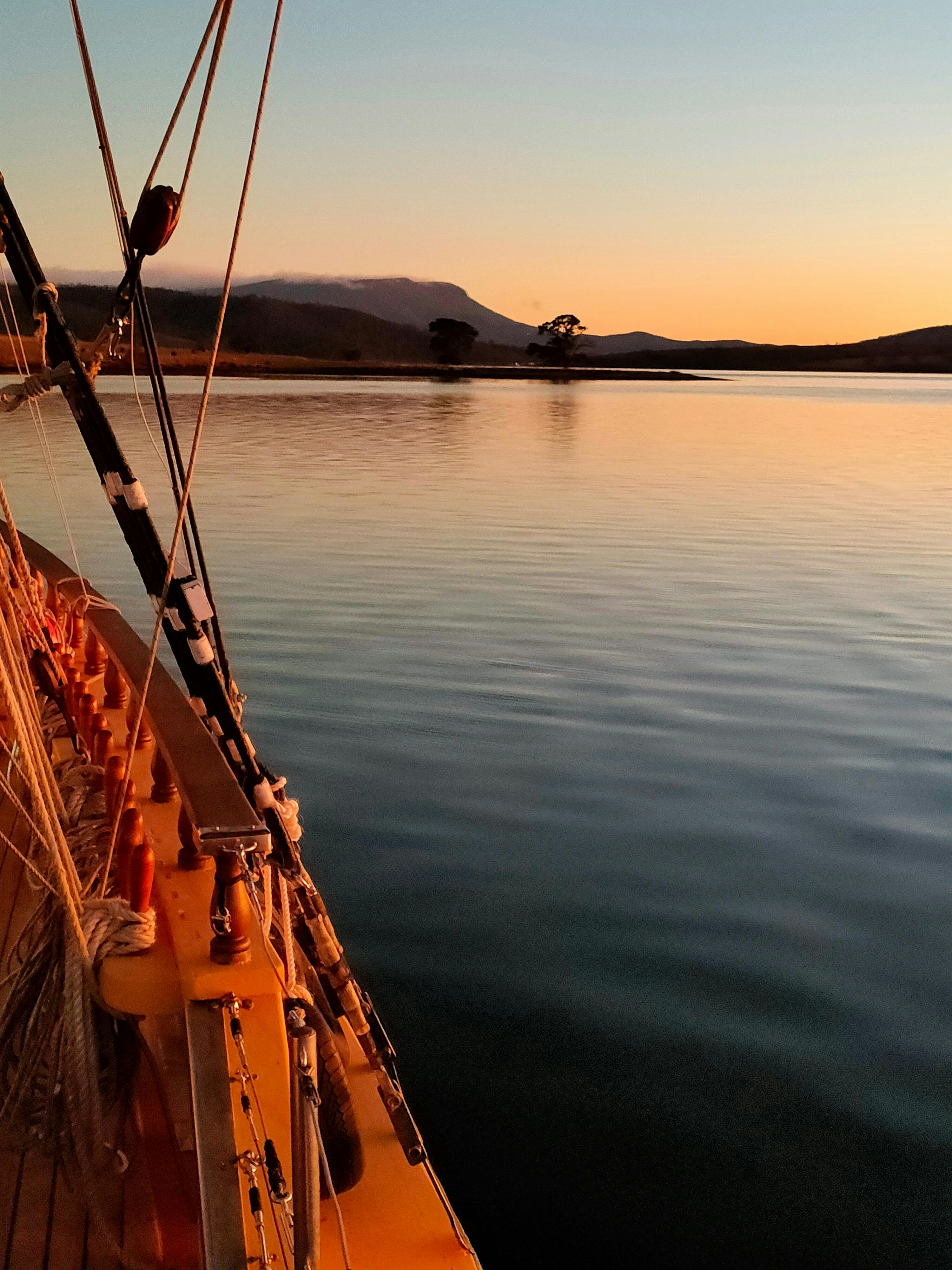 ship in serence anchorage in the pristine water of SE Tasmania