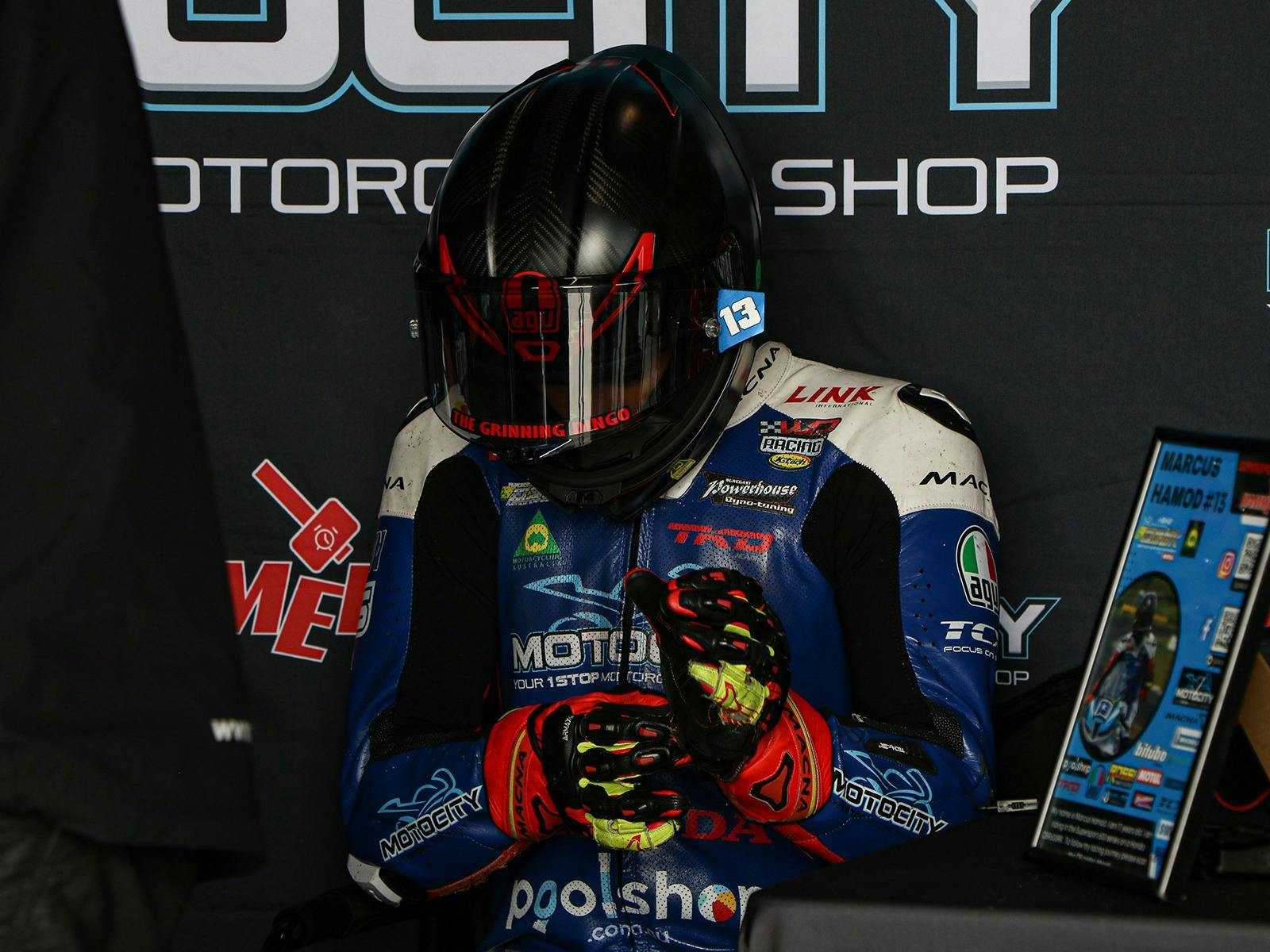 Rider in pits getting ready