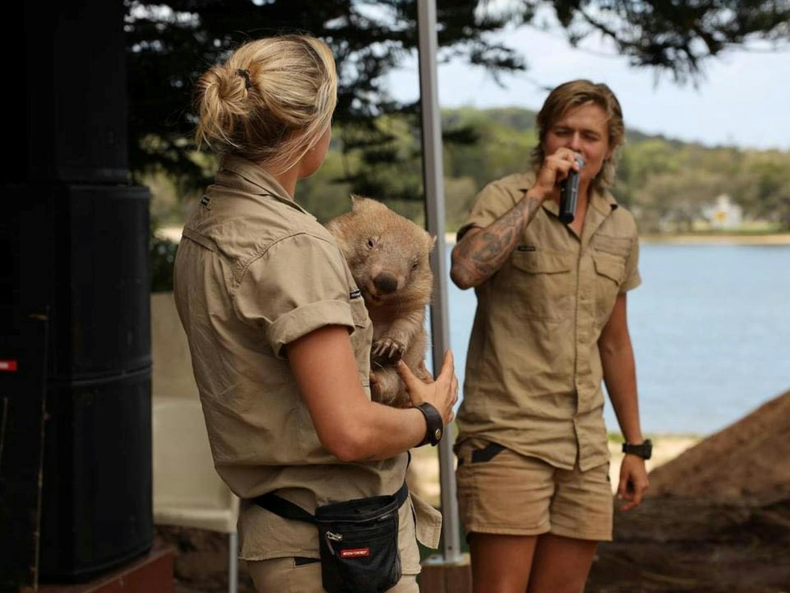 Image of the two wildlife twins presenting with a wombat