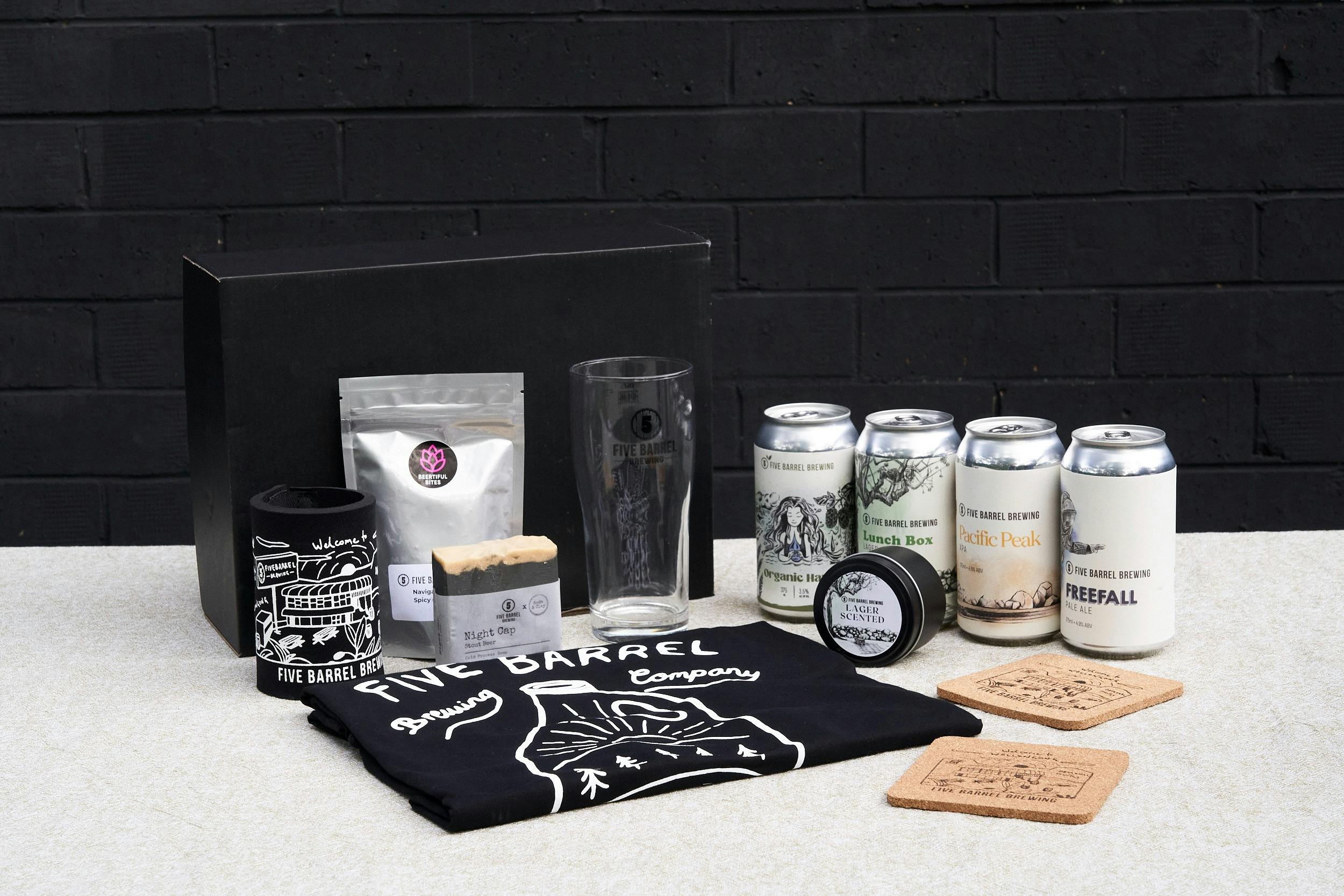 Gift pack with beer, t-shirt, glass, stubby holder and other merchandise