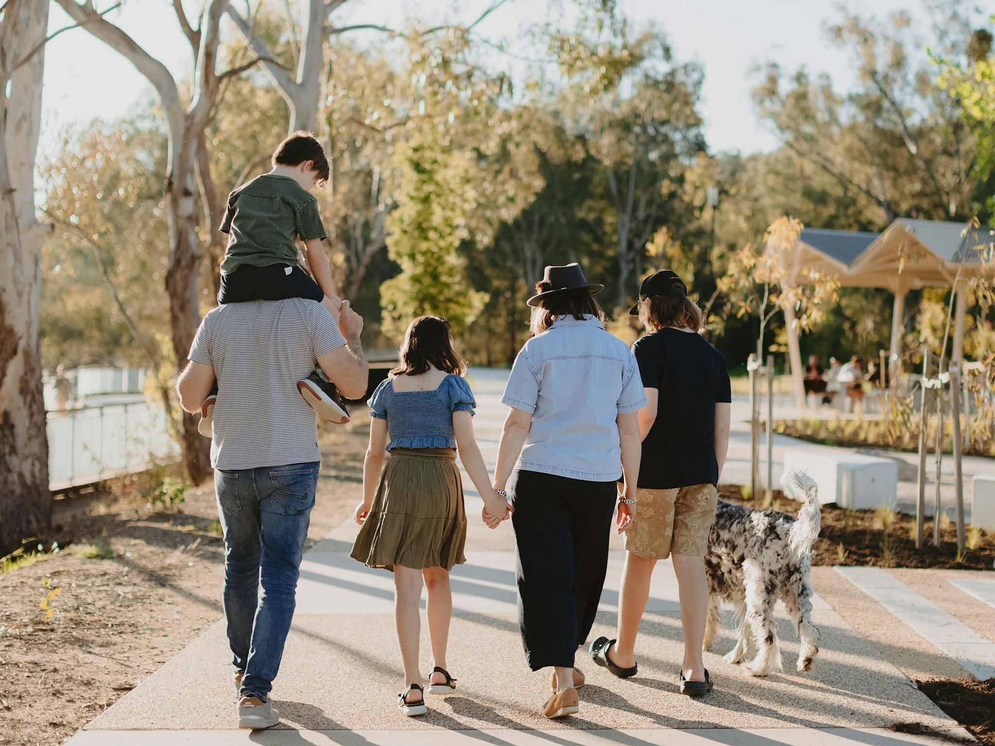 Family walking towards shade at Albury Riverside Precinct