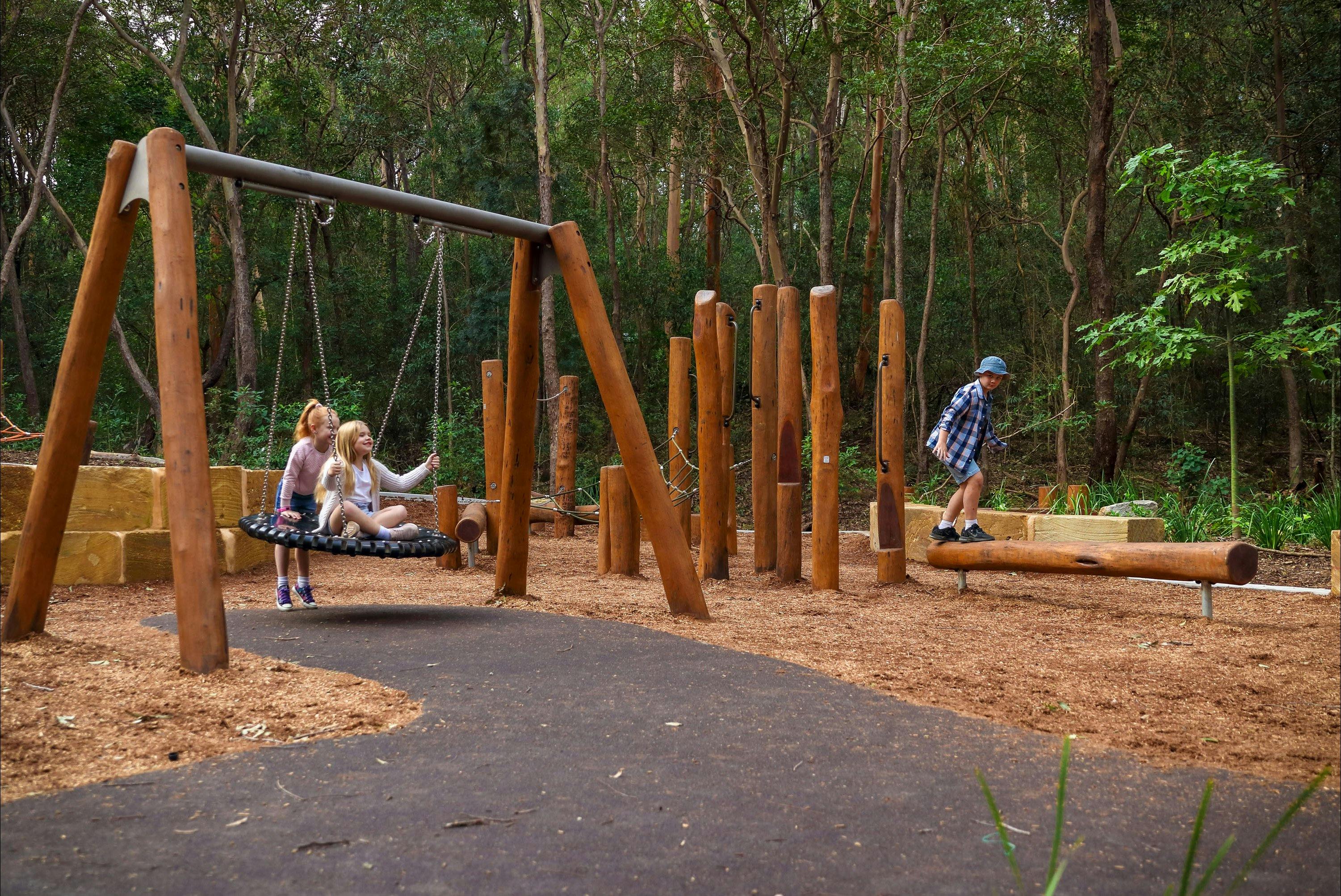 Children playing on playground equipment
