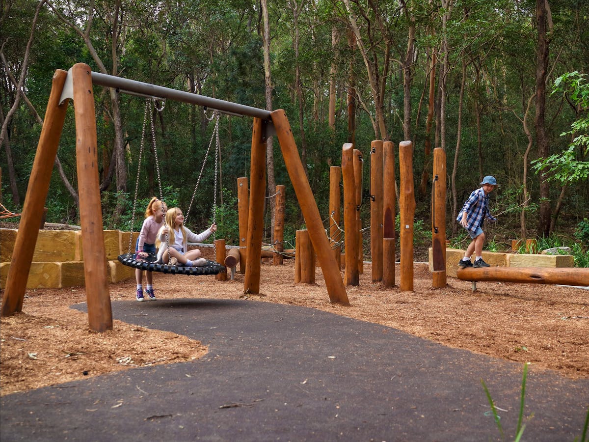 Children playing on playground equipment
