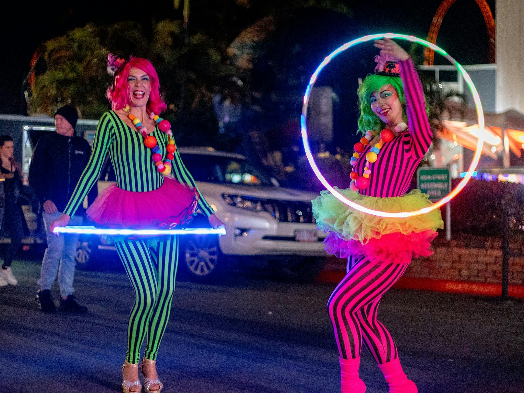 Glow entertainers at Moonlight Night market