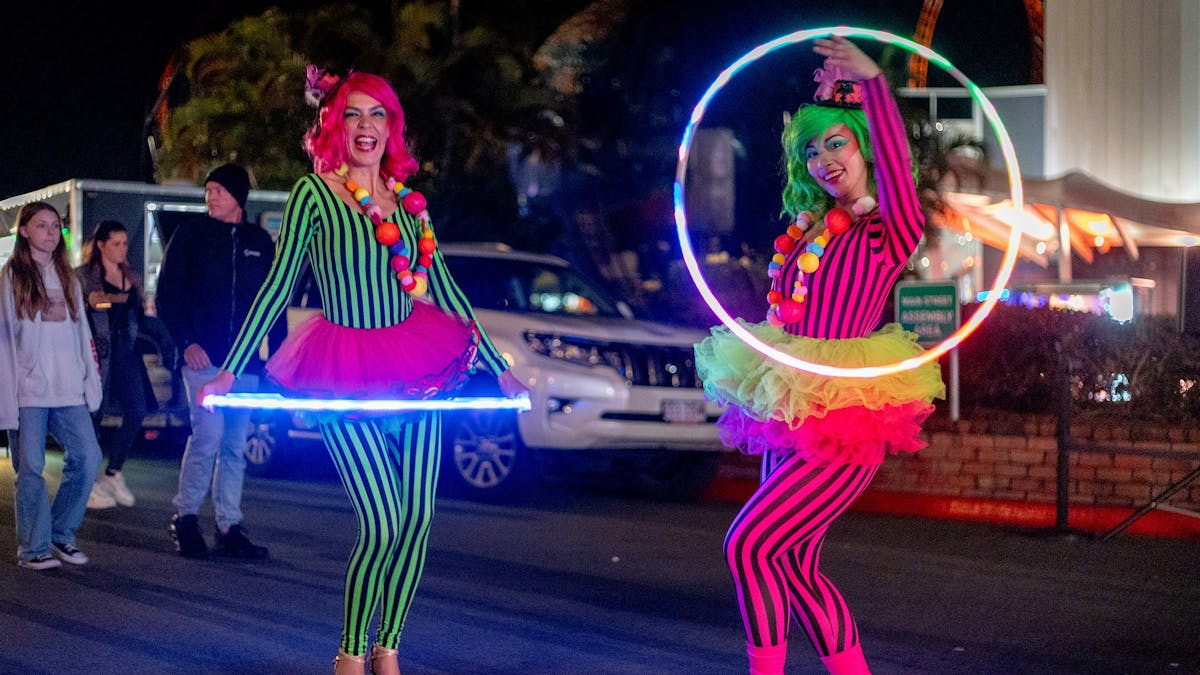 Glow entertainers at Moonlight Night market