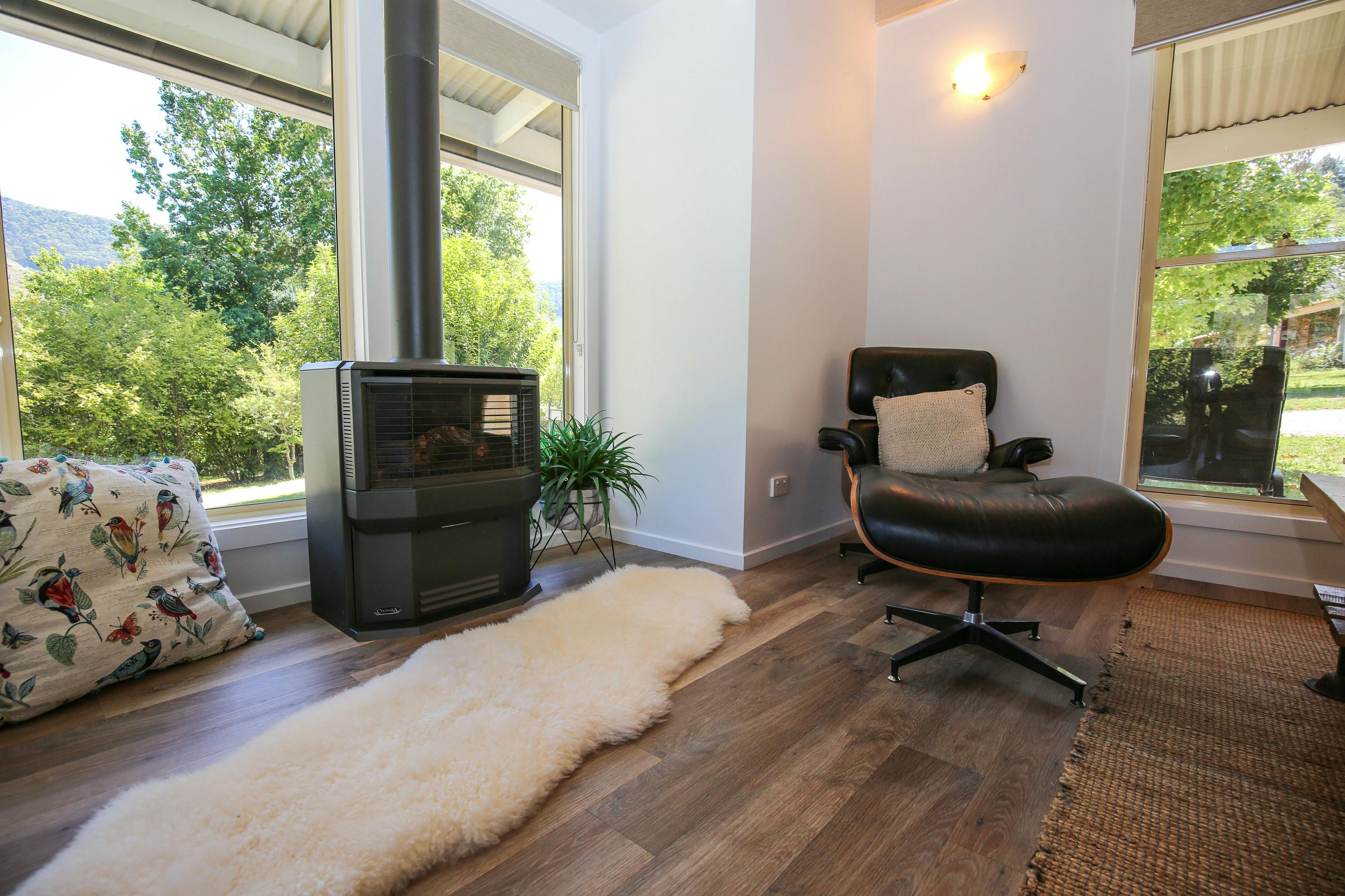 Abby's Cottage fireplace and lounge chair