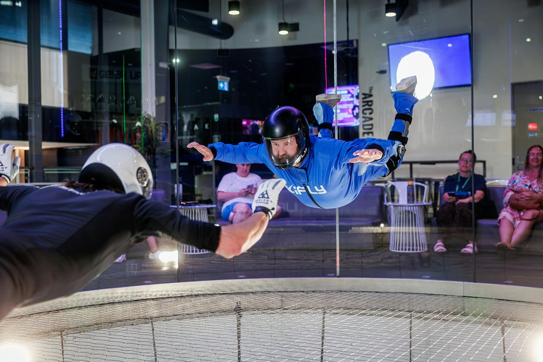 All Abilities Ambassador Greg flies with instructor while wearing a leg brace.