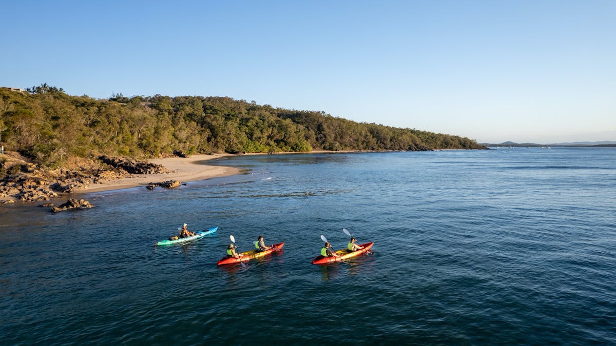 Aerial view of three kayaks on a Kayak adventure tour with 1770 Liquid Adventures in Queensland