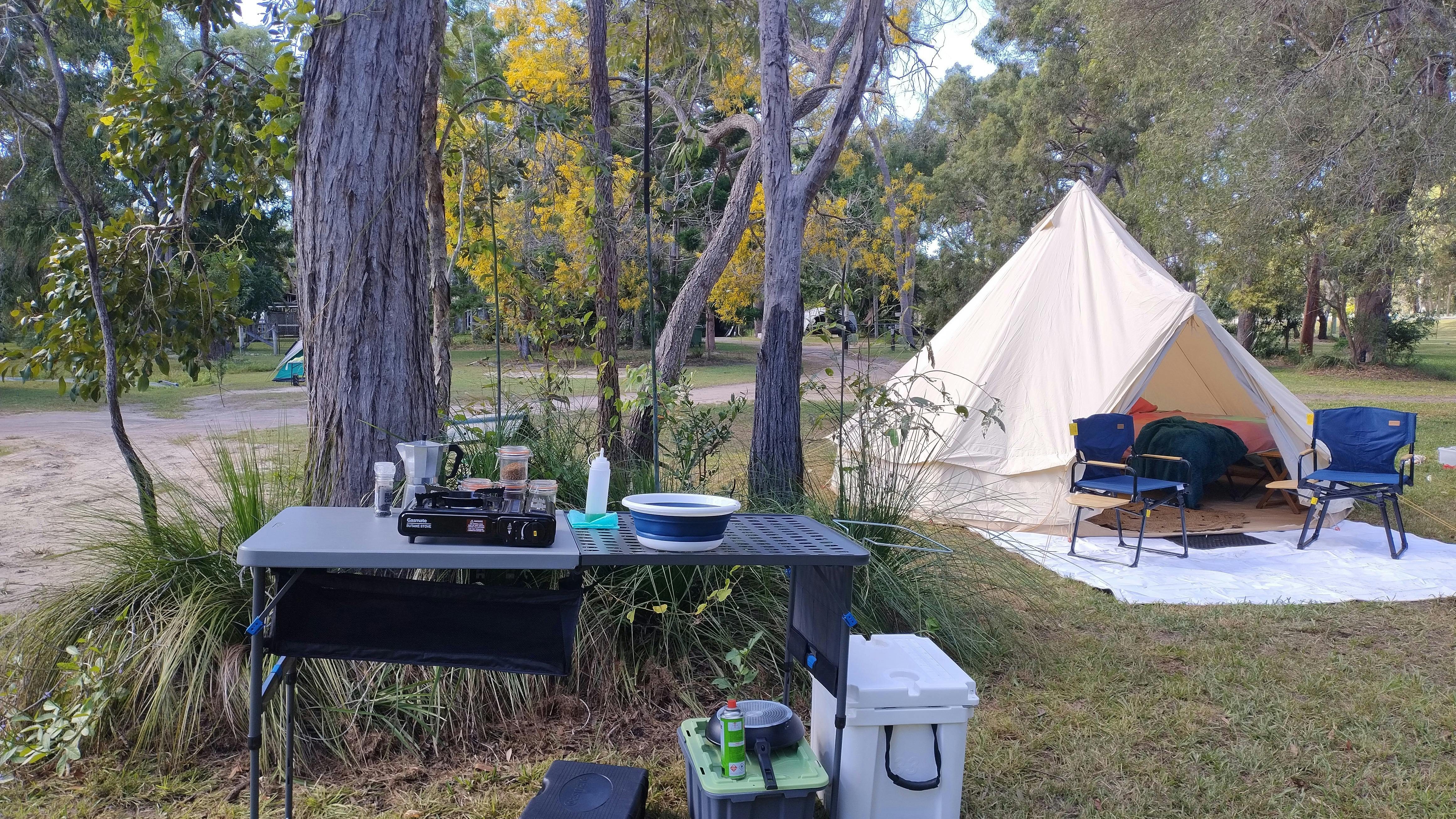 Bell tent camp with full kitchen setup