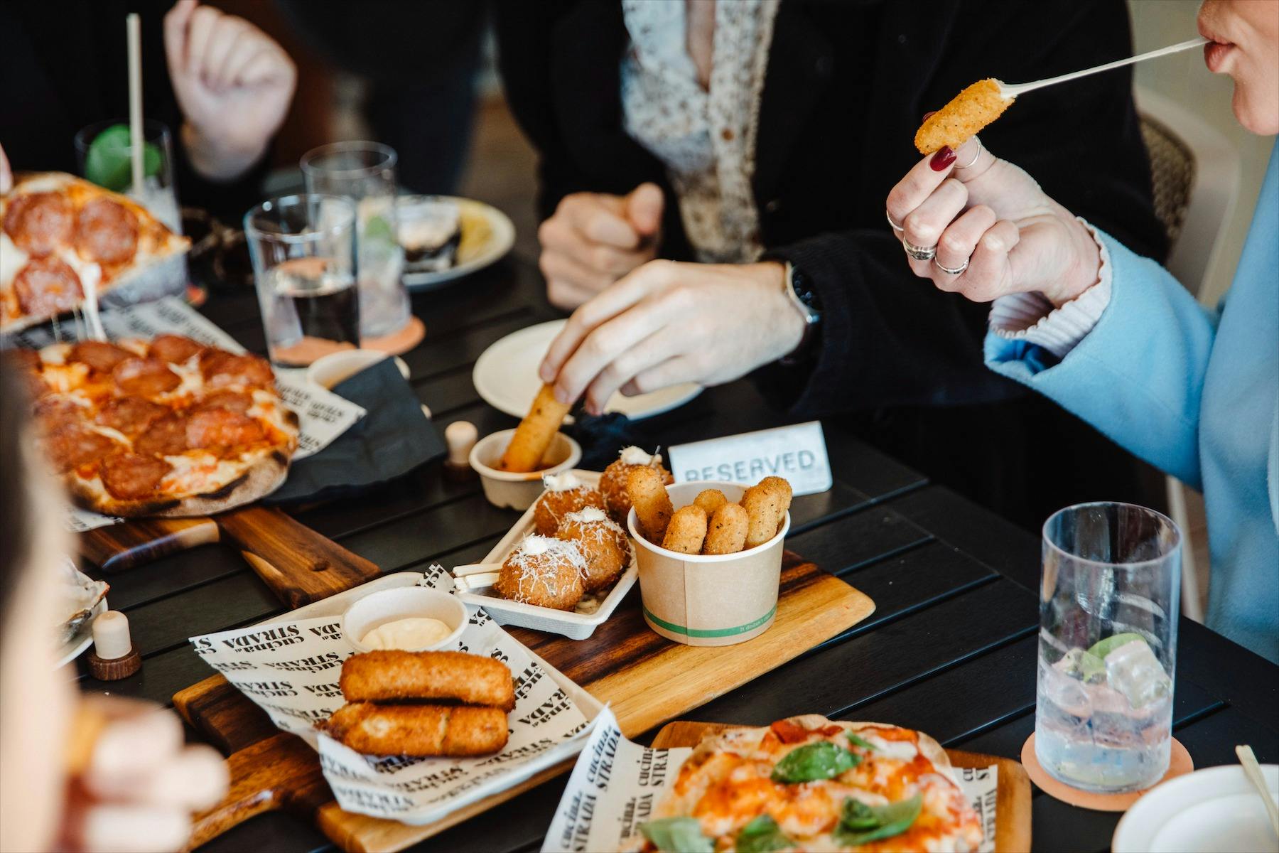 Shared pizzas and snacks enjoyed at Never Never Distillery Door, McLaren Vale.