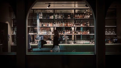 Night street view of Corella Bar