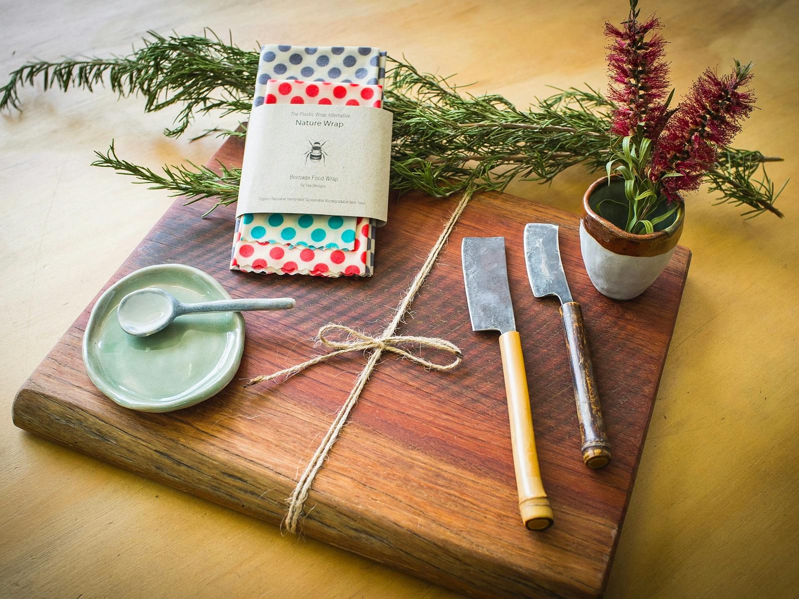 Handmade chopping board, cheese knives, ceramics and beeswax wraps