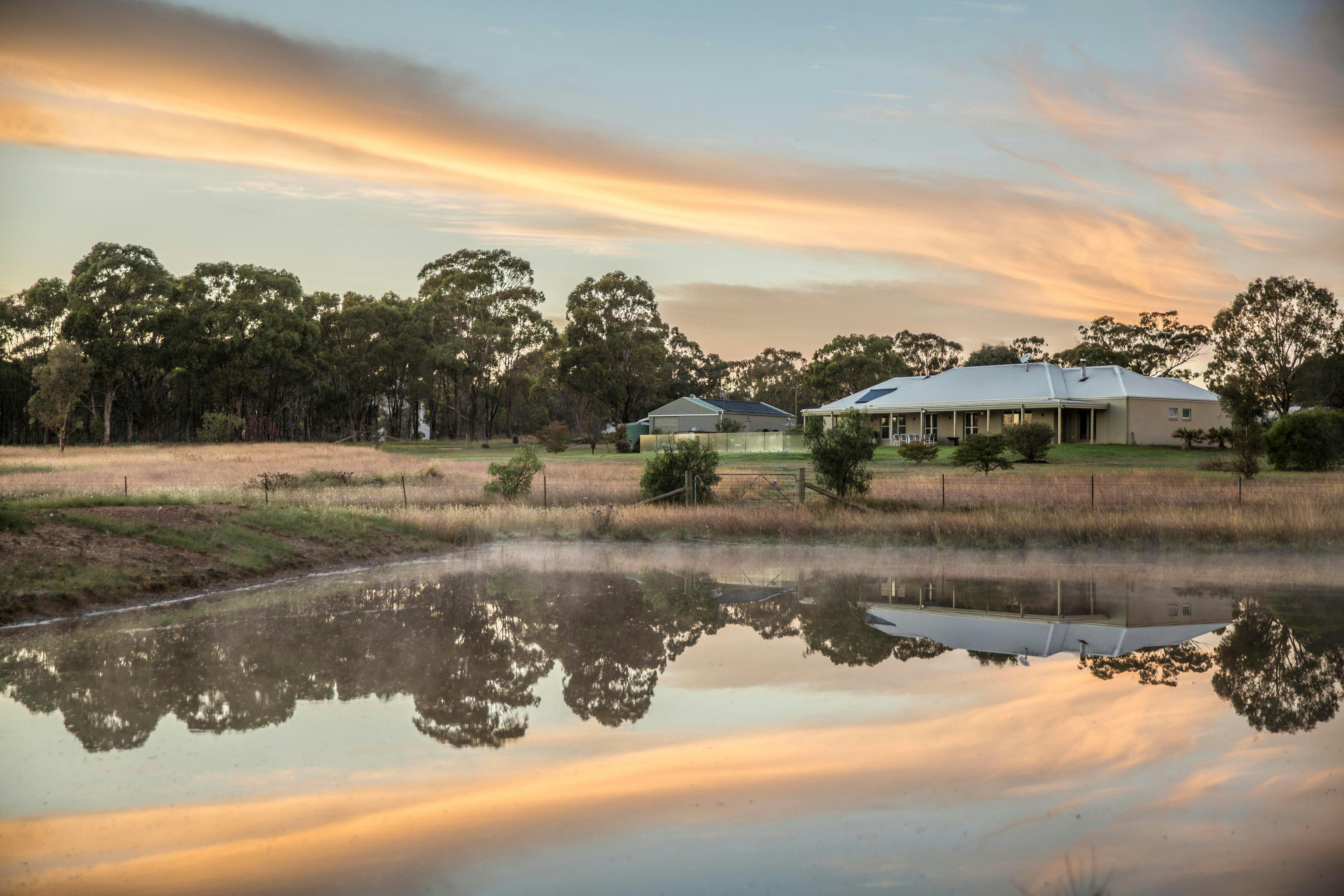 Abingdon House with dam in the foreground