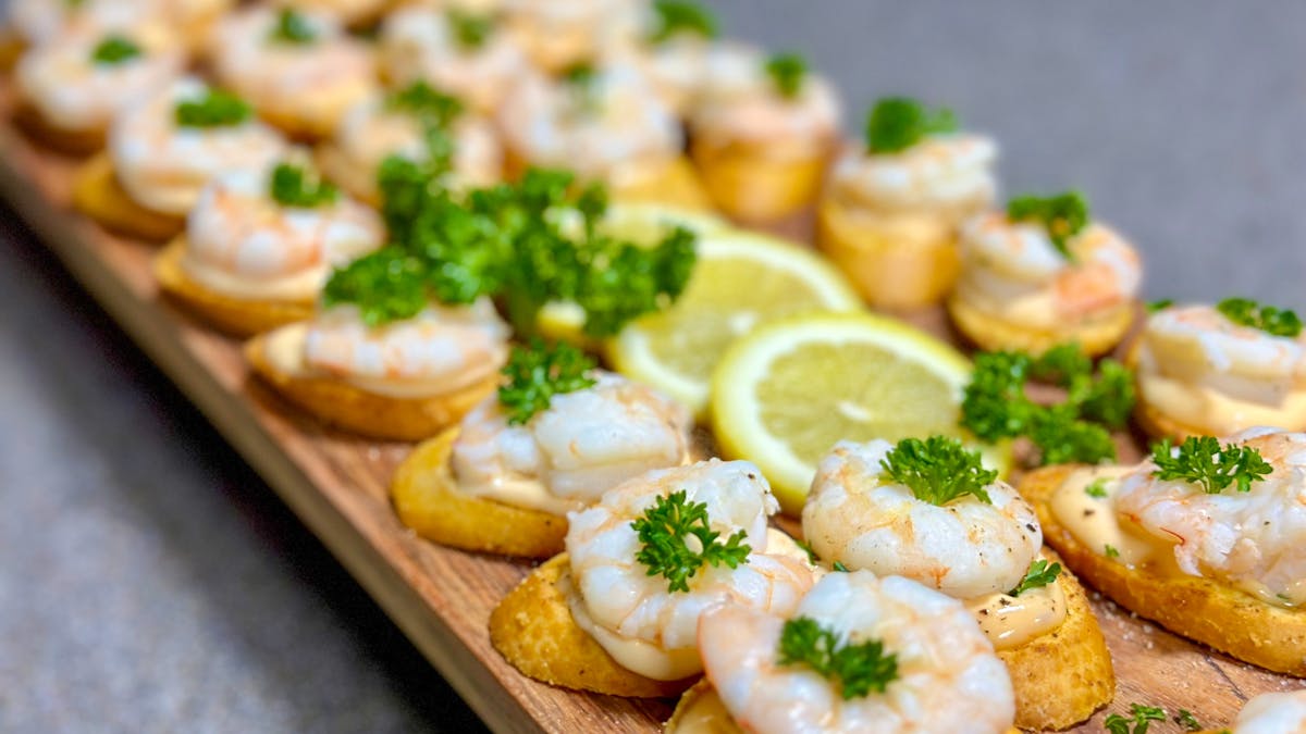 image of canapes platter with prawn crostinis