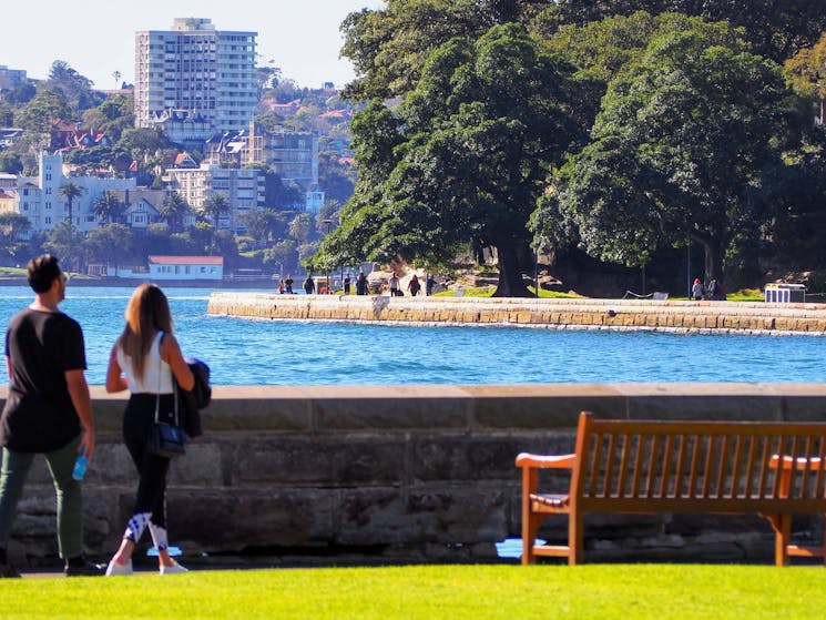 Walking path along sea wall in Sydney Royal Botanic Garden - Quay People tour, Local Travel Planner