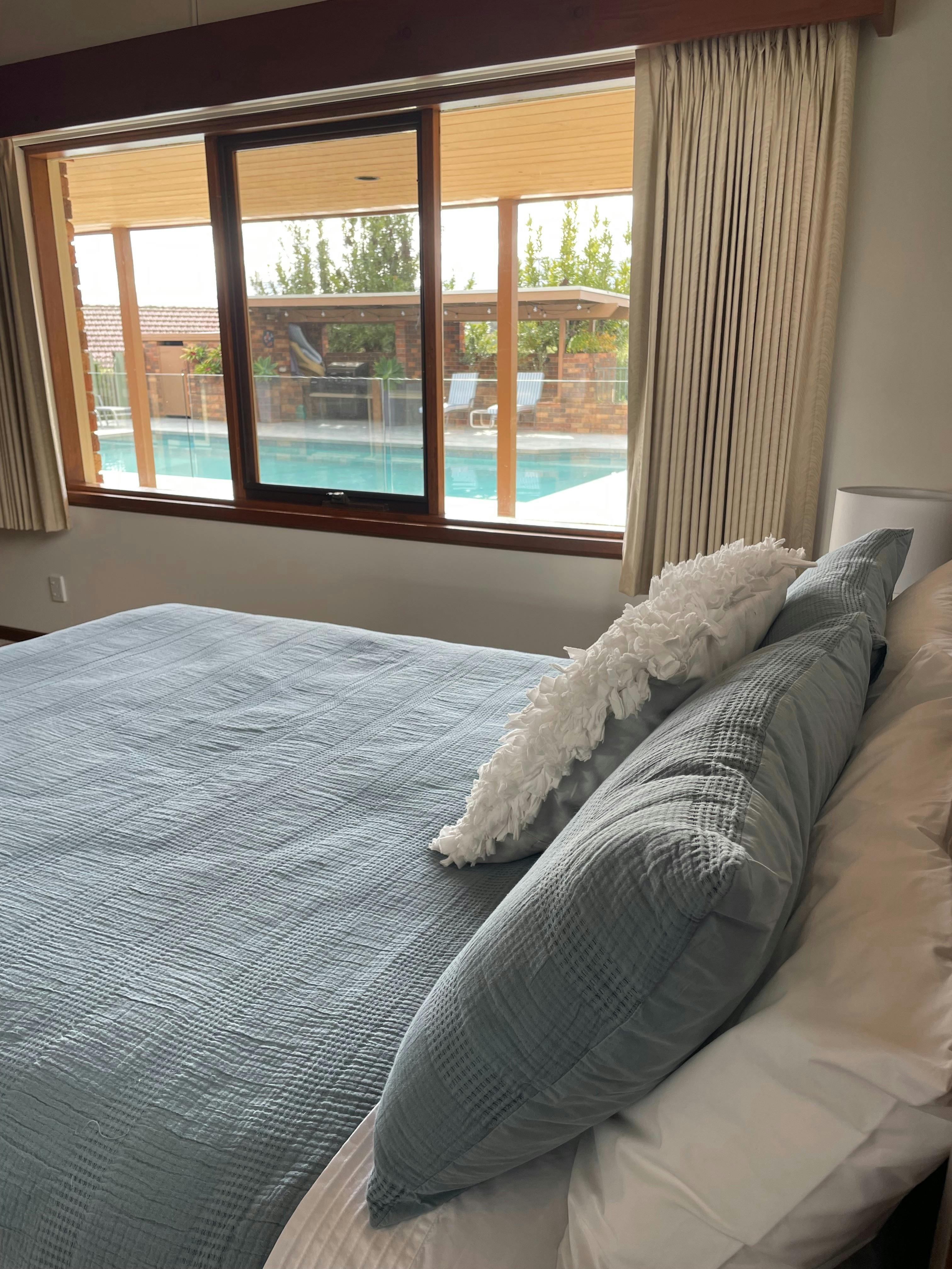 Cottage bedroom -Every window has a view...sleep ins look even better.