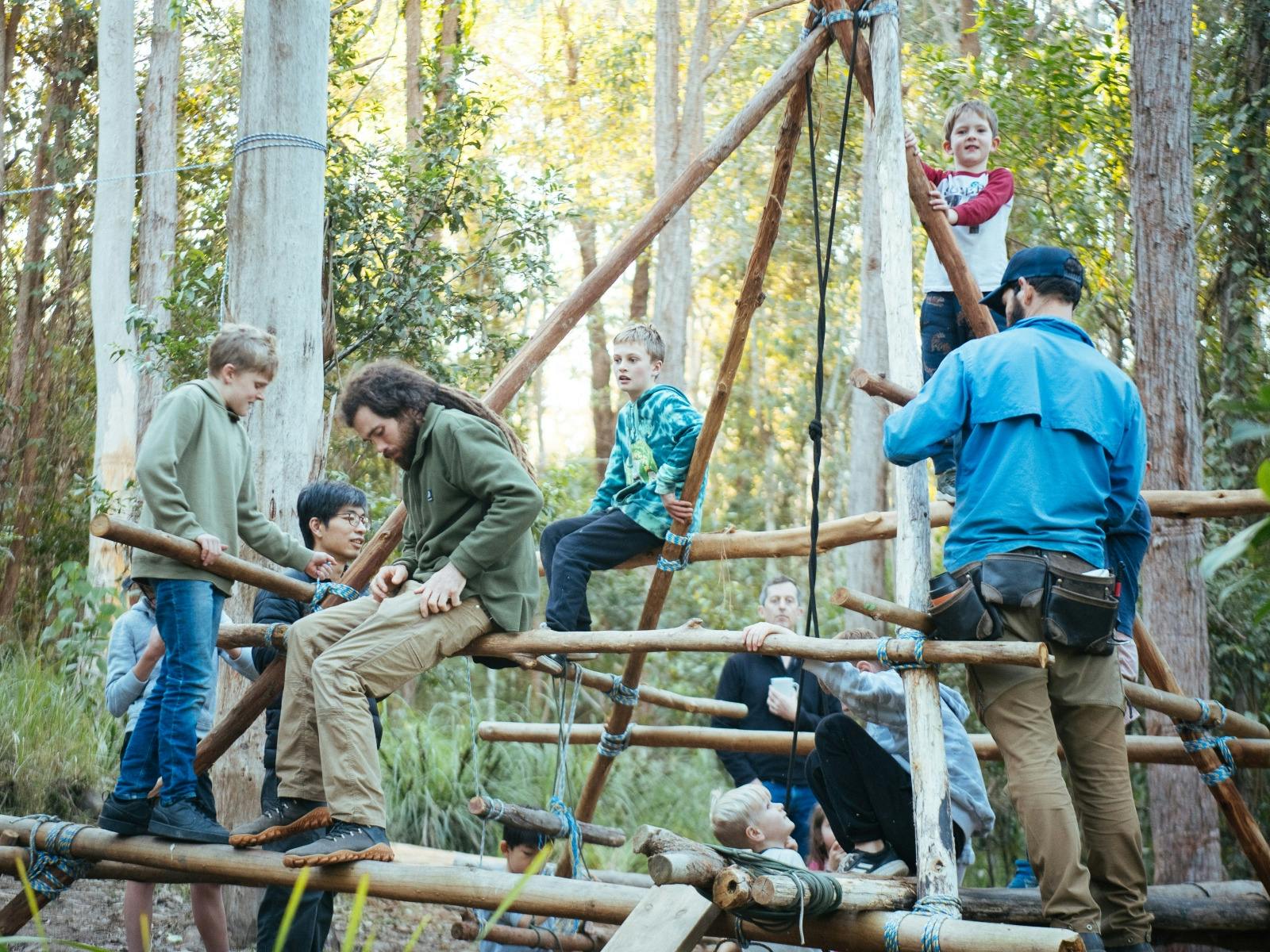 Kids Play on wooden playground at school holiday camp "Friends of Wangat" at Wangat Lodge