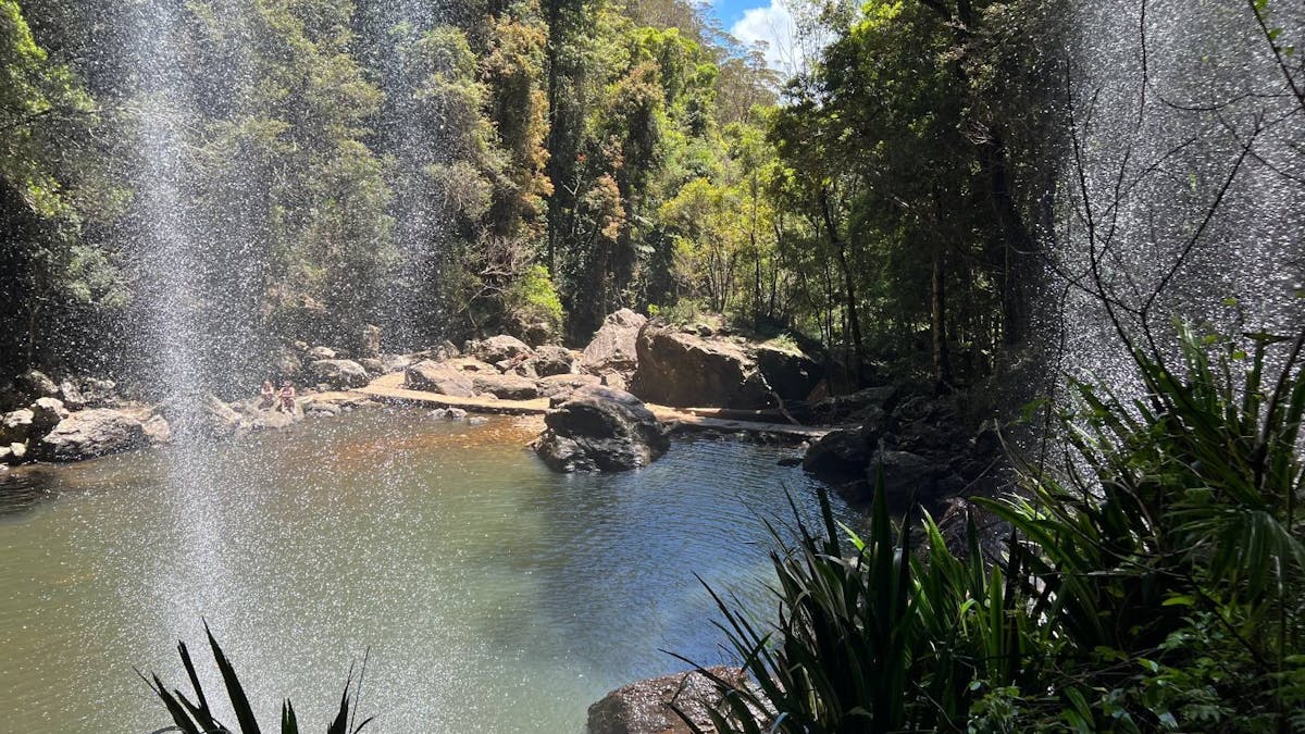 Twin water falls set amongst rocky outcrops in a national park