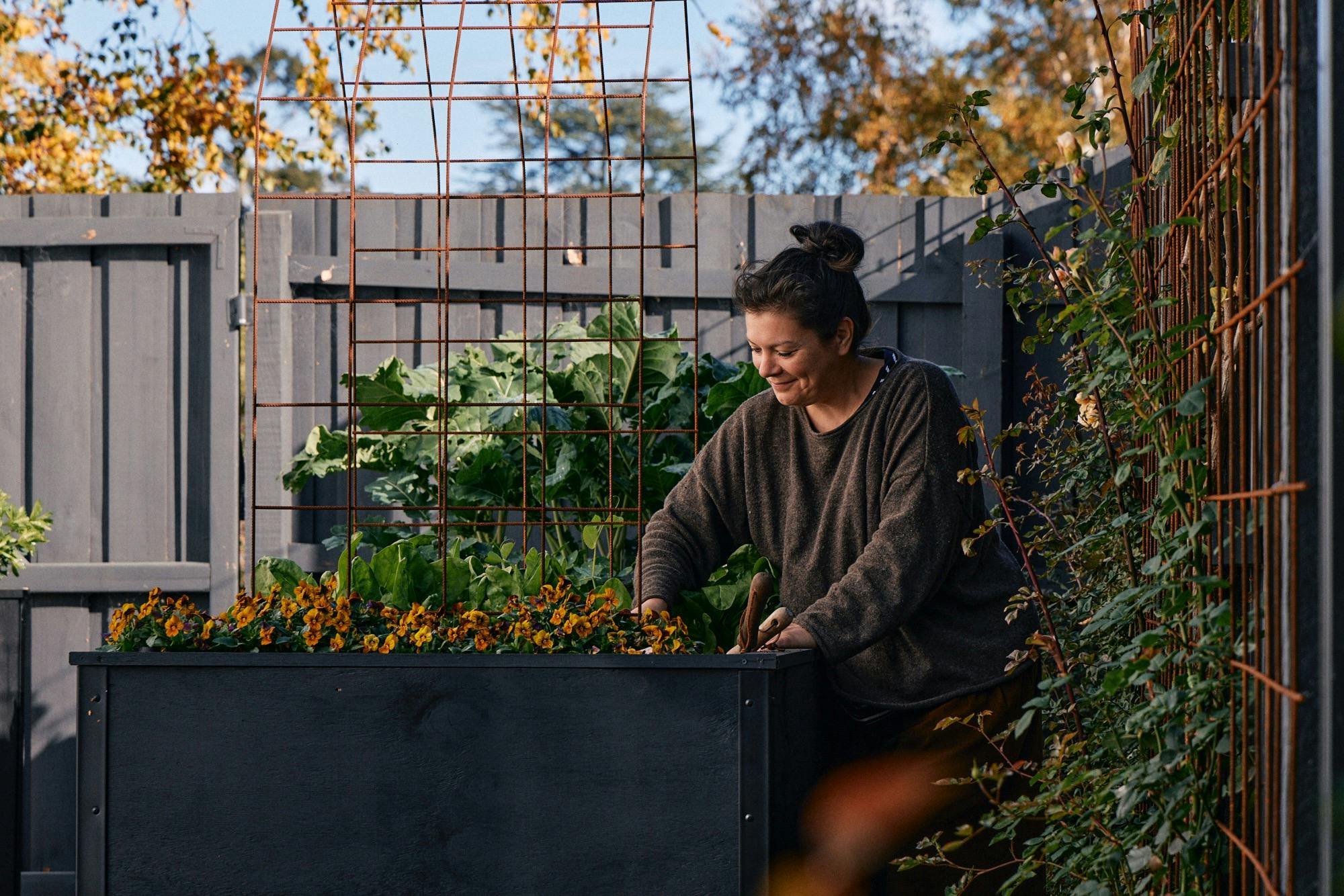 Natasha in the wicking bed garden at Little Cottage on a Hill