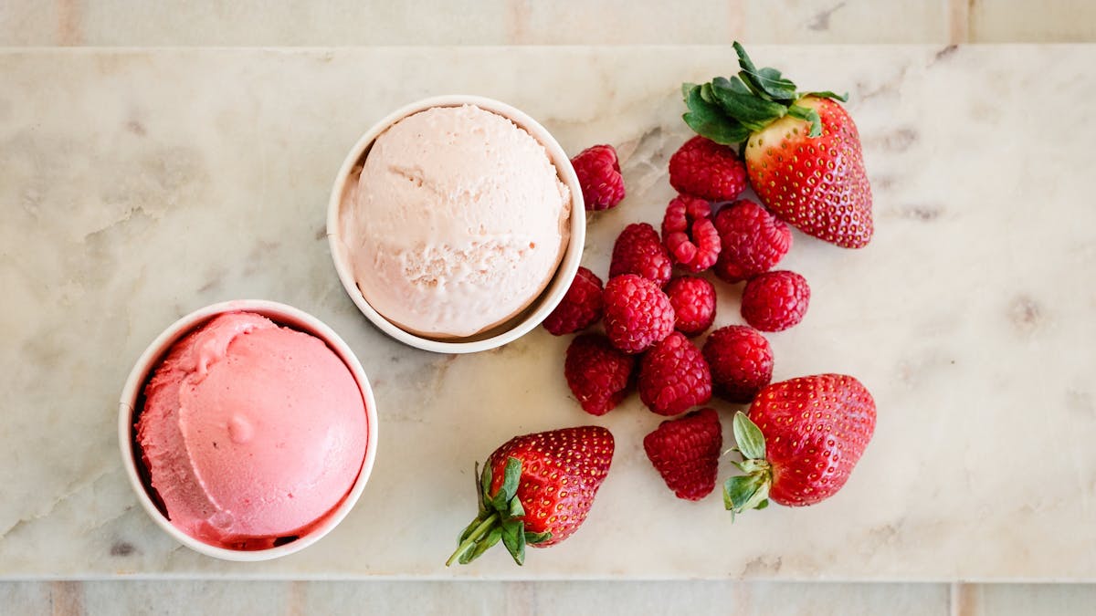 2 tubs of Maleny Food Co gelato with strawberries