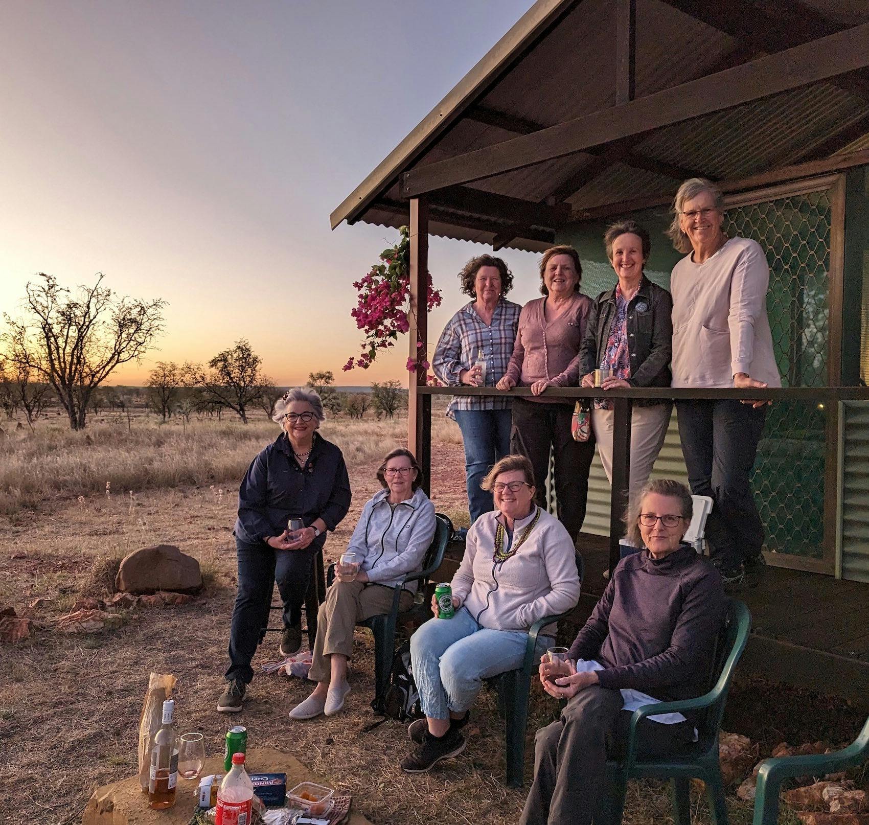 People gathered around a bush hut in the Kimberley