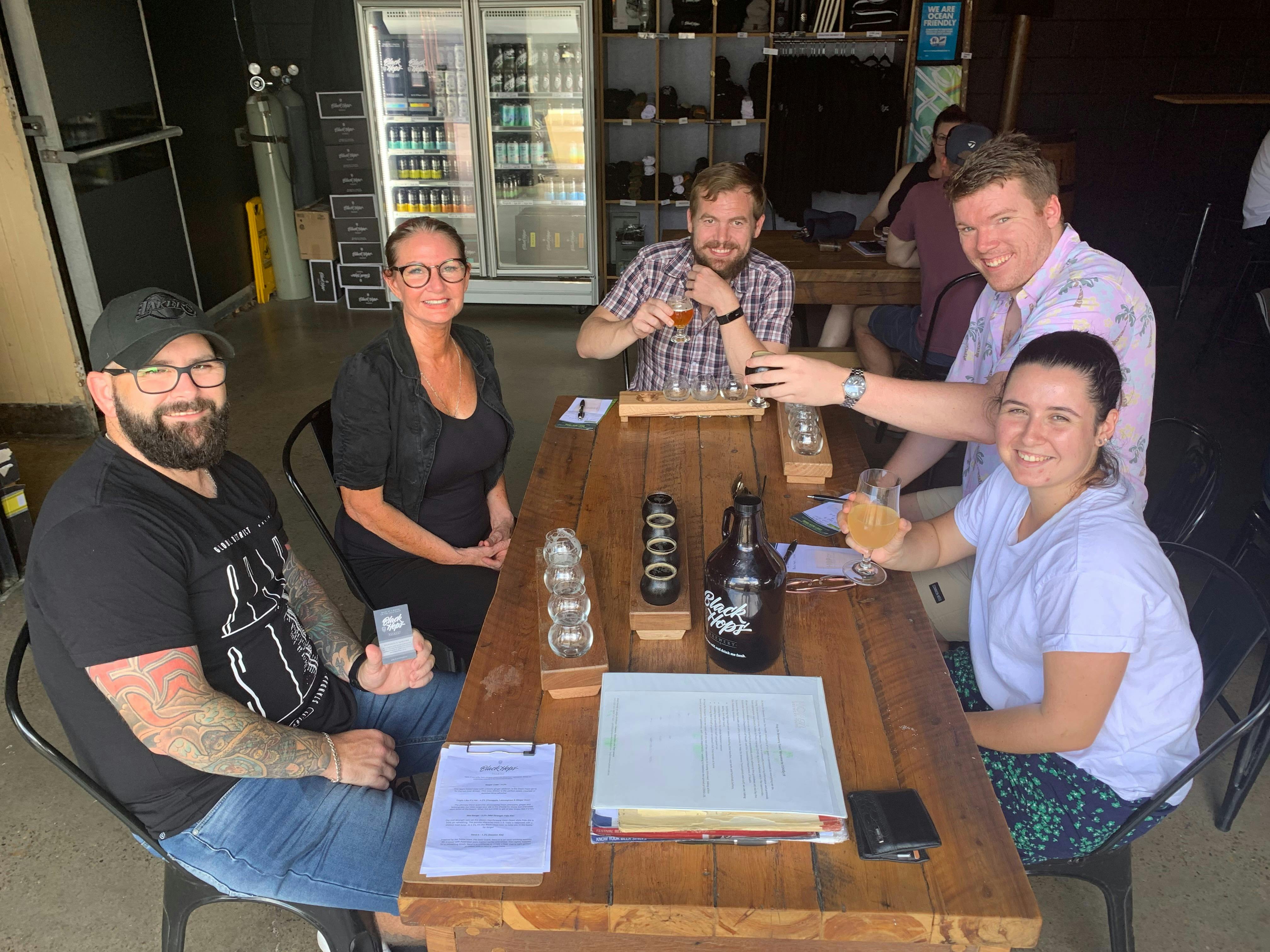 A group sampling beers at Black Hops