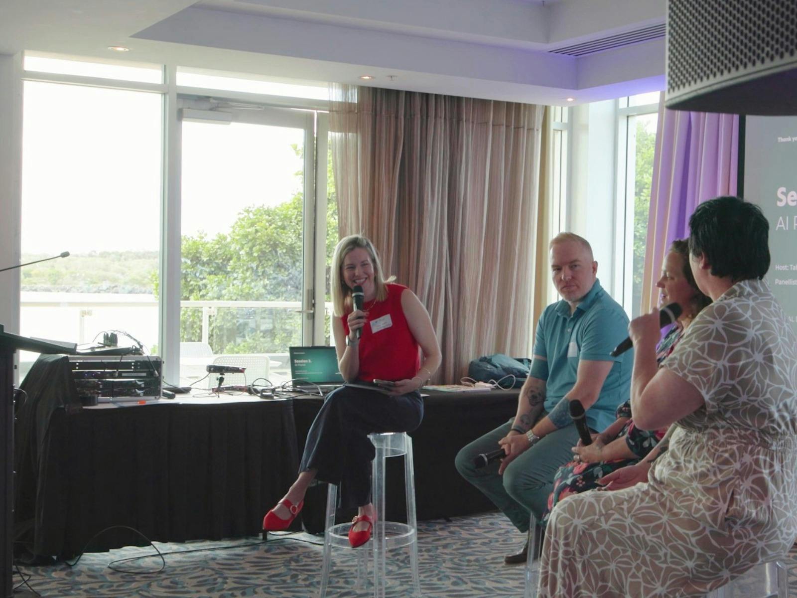 The panel leads a discussion about building AI assistants and  the biggest struggle with AI.