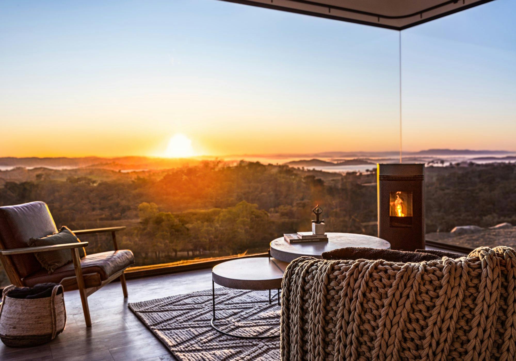 Beautiful living room with large glass windows and incredible view