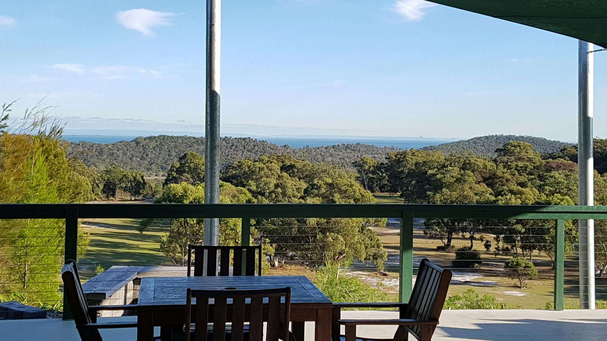 Sit back and enjoy the view across Moreton Bay to teh Glasshouse Mountains