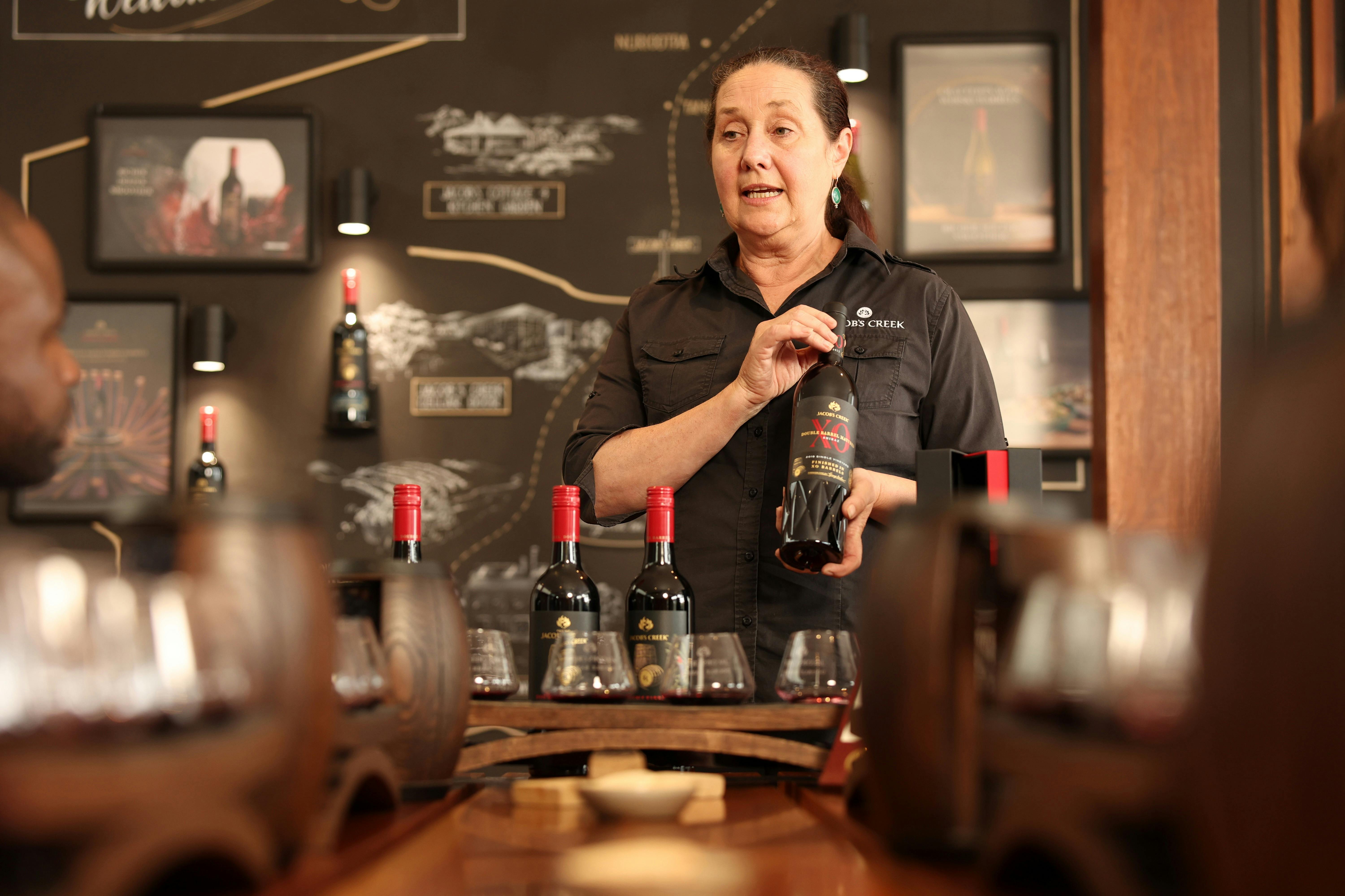Double-Barrel experience host explaining to group