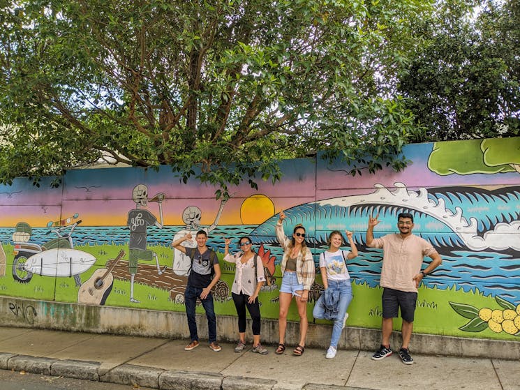 Check out cool street art with a fun group