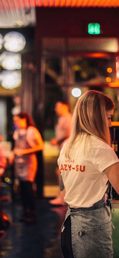 Restaurant interior at night filled with diners