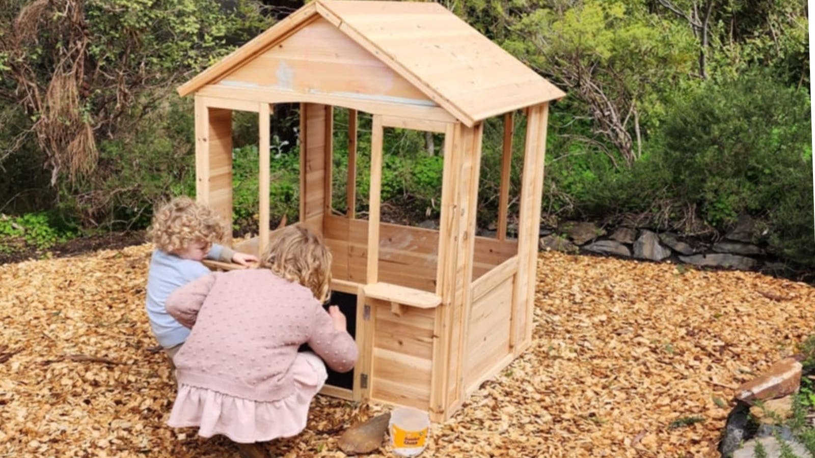 Children playing in a cubby house at Aphelion Cellar Door