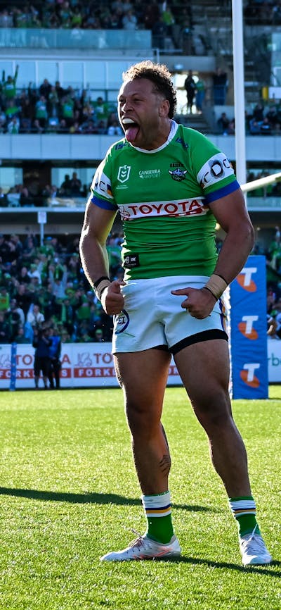 Canberra Raiders player Sebastian Kris celebrating a try.