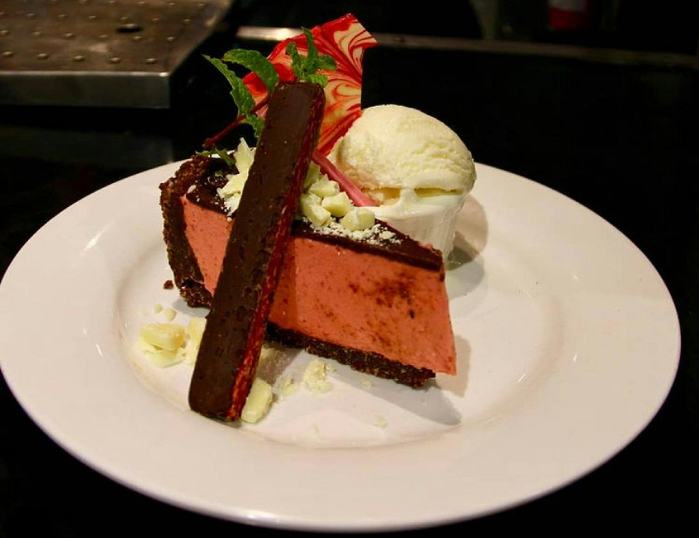 Dessert at the Royal Hotel Adelong, picture is a chocolate cherry cheesecake, served with ice cream