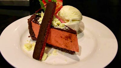 Dessert at the Royal Hotel Adelong, picture is a chocolate cherry cheesecake, served with ice cream