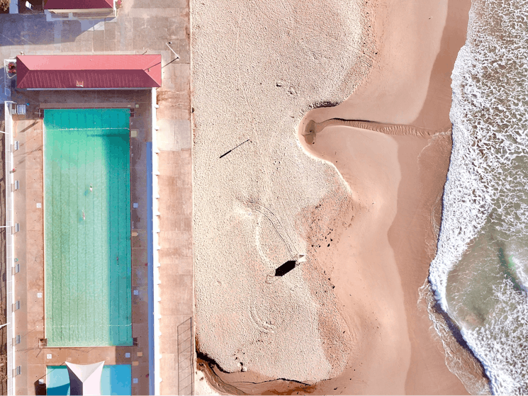 Aerial view of pool and beach