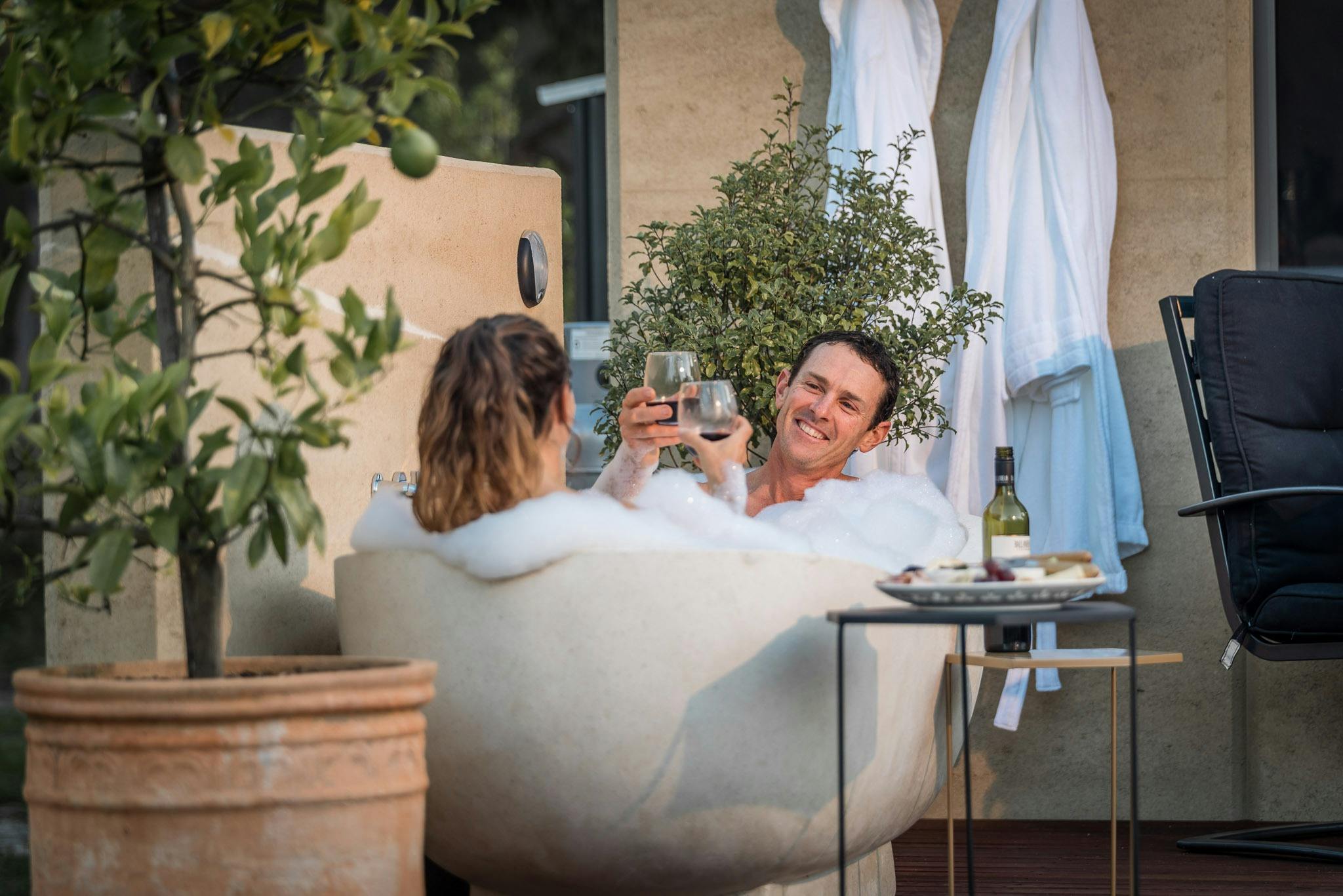 A couple enjoying an extra night at Earth & Soul Retreat on the Granite Belt, Southern Queensland